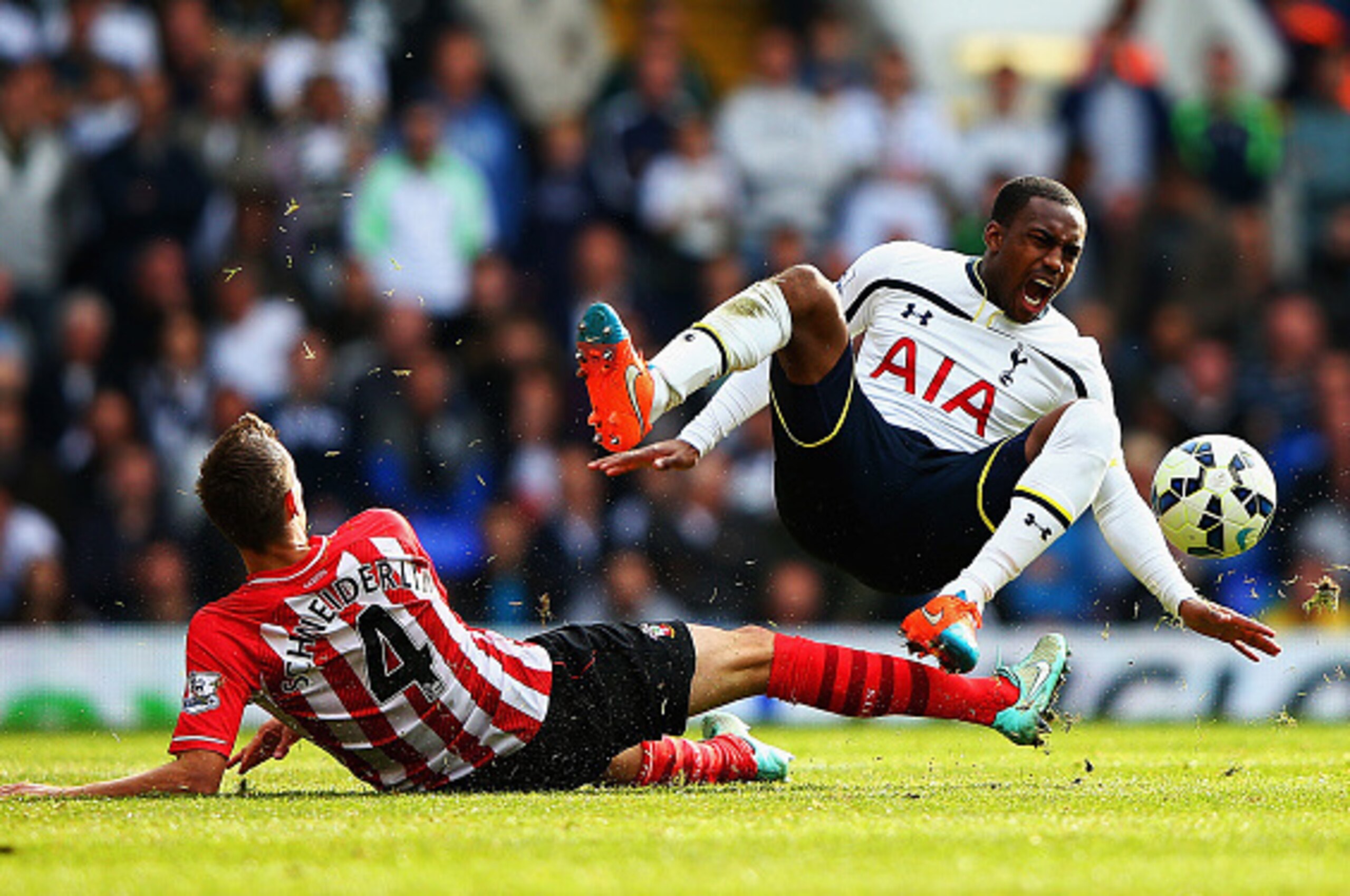LONDON, ENGLAND - OCTOBER 05: (EDITORS NOTE: Retransmission with alternate crop)  Morgan Schneiderlin of Southampton challenges Danny Rose of Spurs during the Barclays Premier League match between Tottenham Hotspur and Southampton at White Hart Lane on Oc