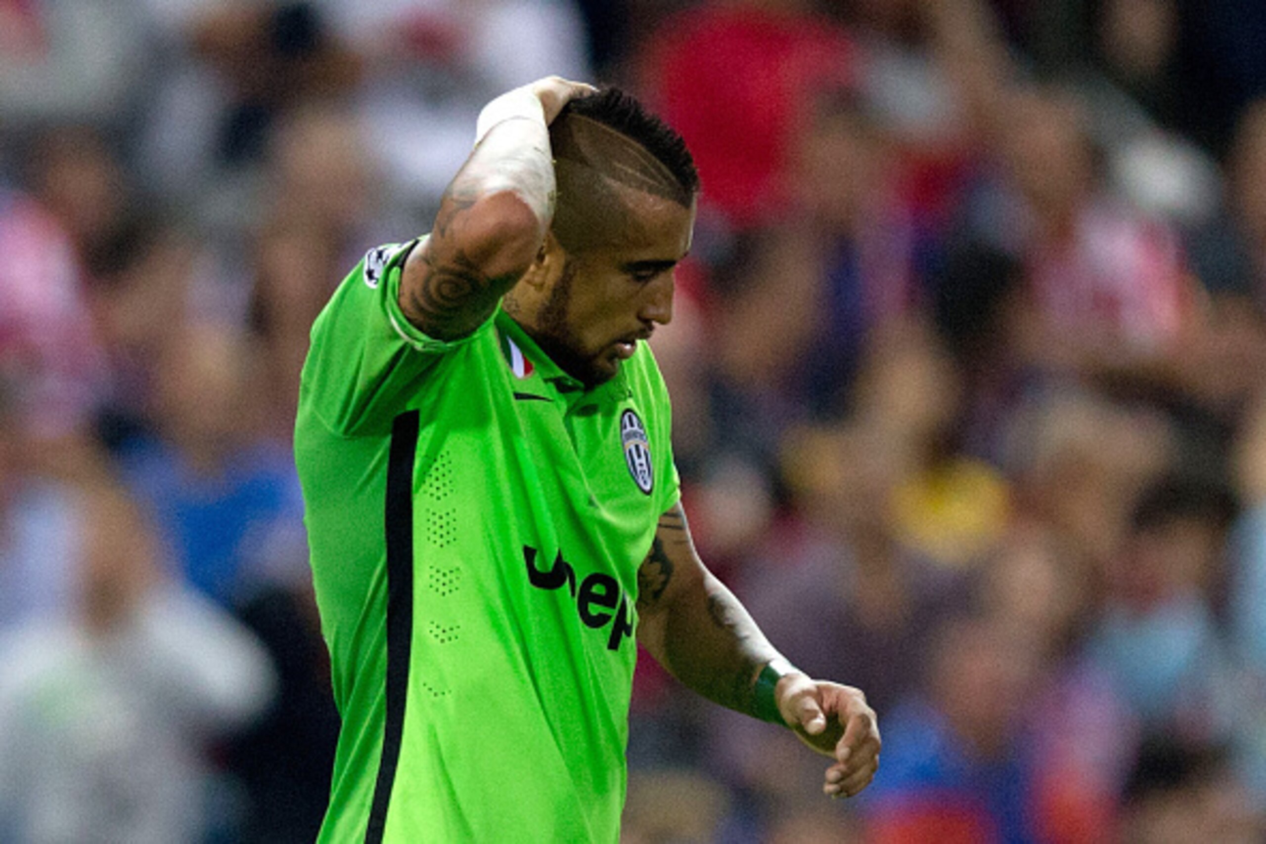 MADRID, SPAIN - OCTOBER 01: Arturo Vidal of Juventus reacts during the UEFA Champions League group A match between Club Atletico de Madrid and Juventus at Vievnte Calderon Stadium on October 1, 2014 in Madrid, Spain.  (Photo by Gonzalo Arroyo Moreno/Getty