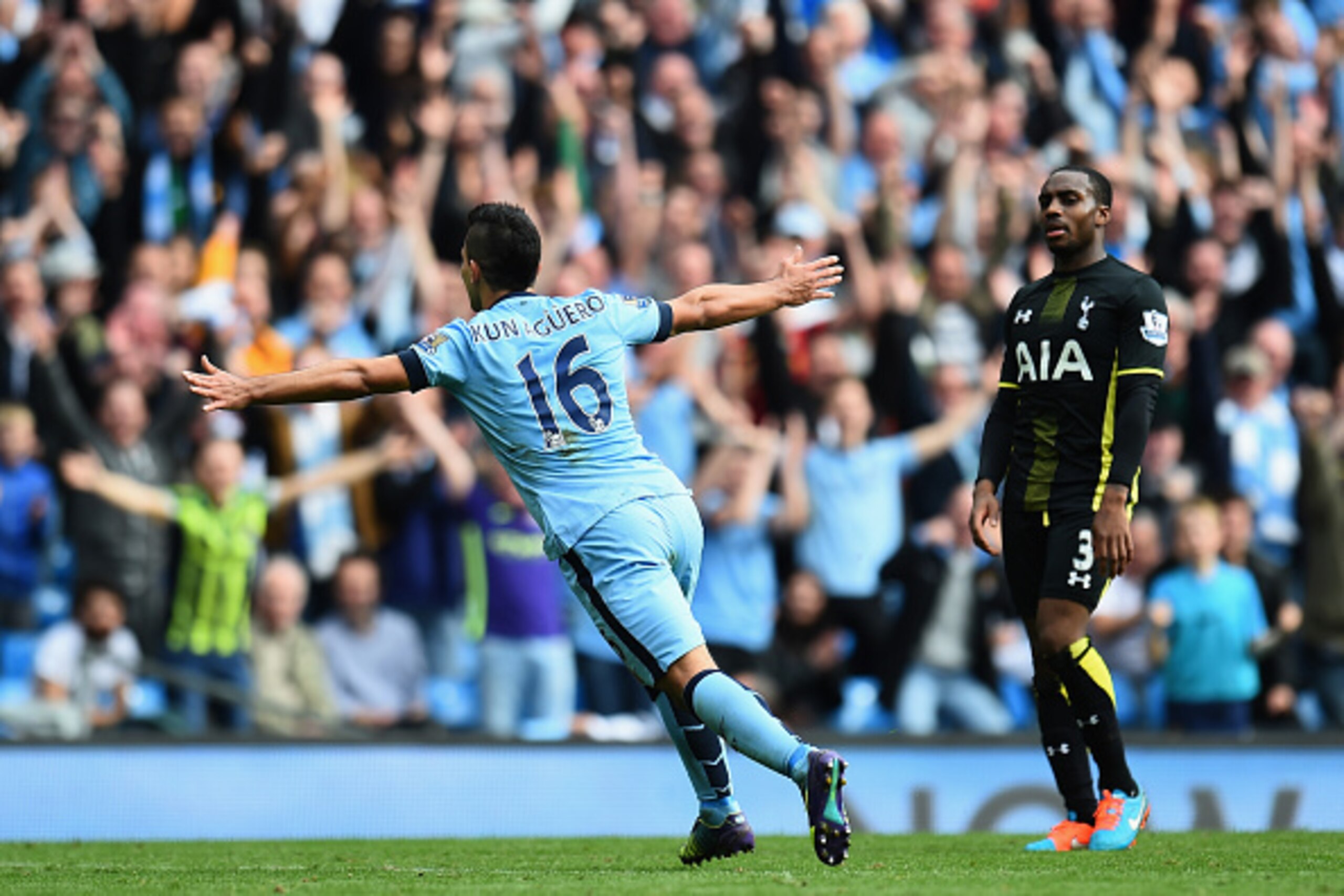 MANCHESTER, ENGLAND - OCTOBER 18:  Sergio Aguero of Manchester City celebrates after scoring his fourth goal as Danny Rose of Tottenham Hotspur looks on during the Barclays Premier League match between Manchester City and Tottenham Hotspur at Etihad Stadi