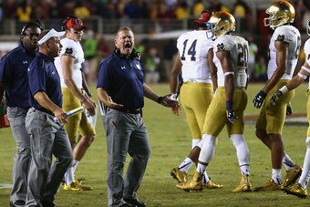 TALLAHASSEE, FL - OCTOBER 18:  Head coach Brian Kelly of the Notre Dame Fighting Irish reacts to a penalty late in the fourth quarter in their game against the Florida State Seminoles at Doak Campbell Stadium on October 18, 2014 in Tallahassee, Florida.  