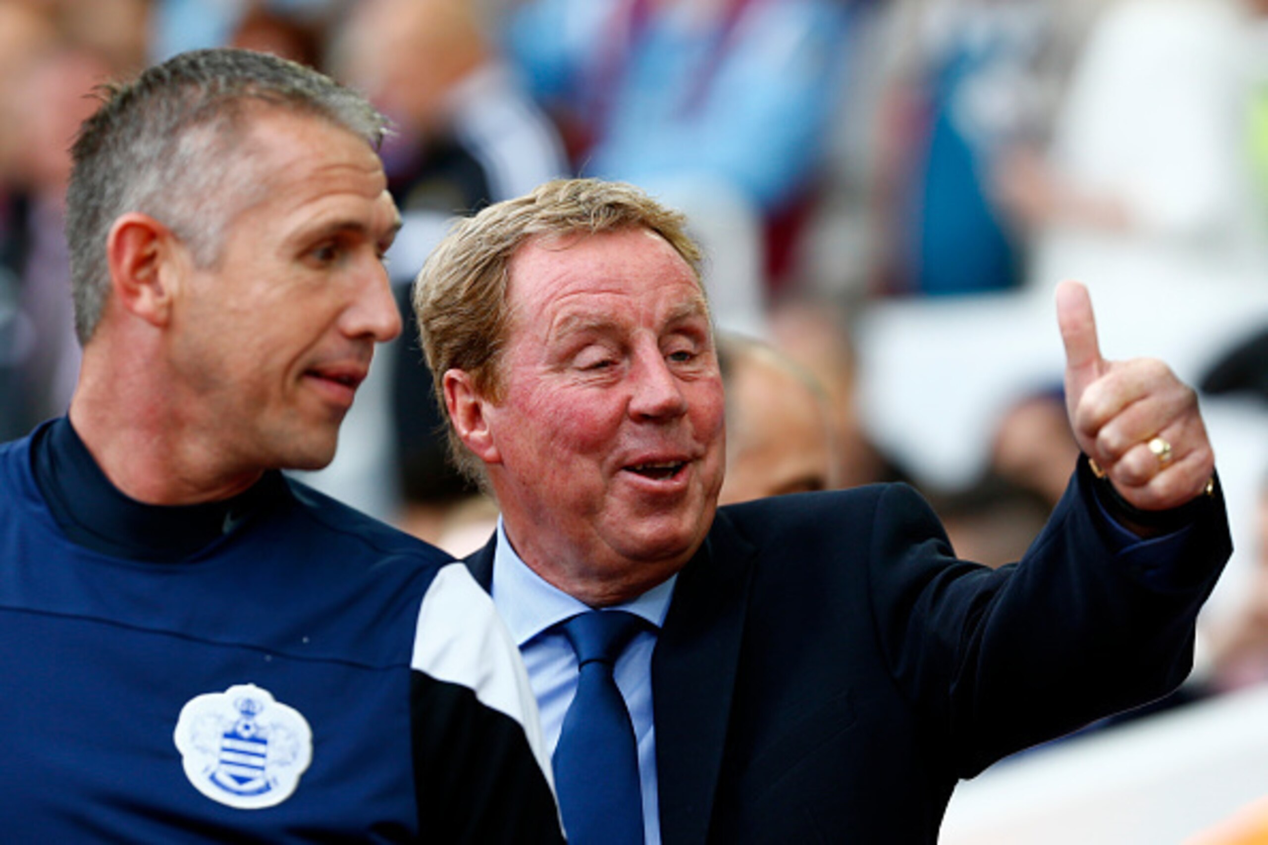 LONDON, ENGLAND - OCTOBER 05:  Harry Redknapp the QPR manager gives a thumbs up as he speaks with his goalkeeping coach Kevin Hitchcock during the Barclays Premier League match between West Ham United and Queens Park Rangers at Boleyn Ground on October 5,