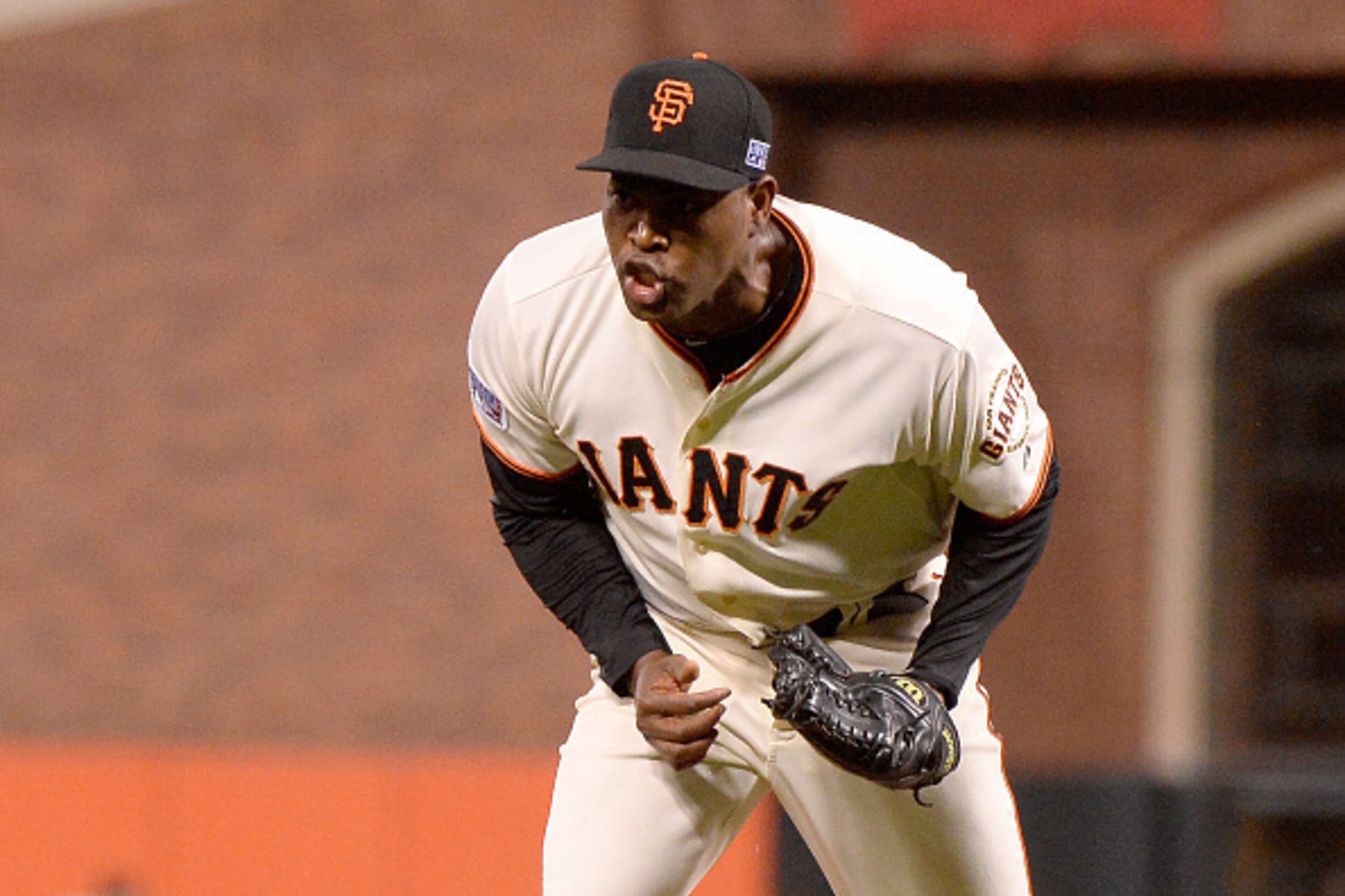 SAN FRANCISCO, CA - OCTOBER 15:  Santiago Casilla #46 of the San Francisco Giants reacts after getting the final out in the ninth inning against the St. Louis Cardinals during Game Four of the National League Championship Series at AT&T Park on October 15