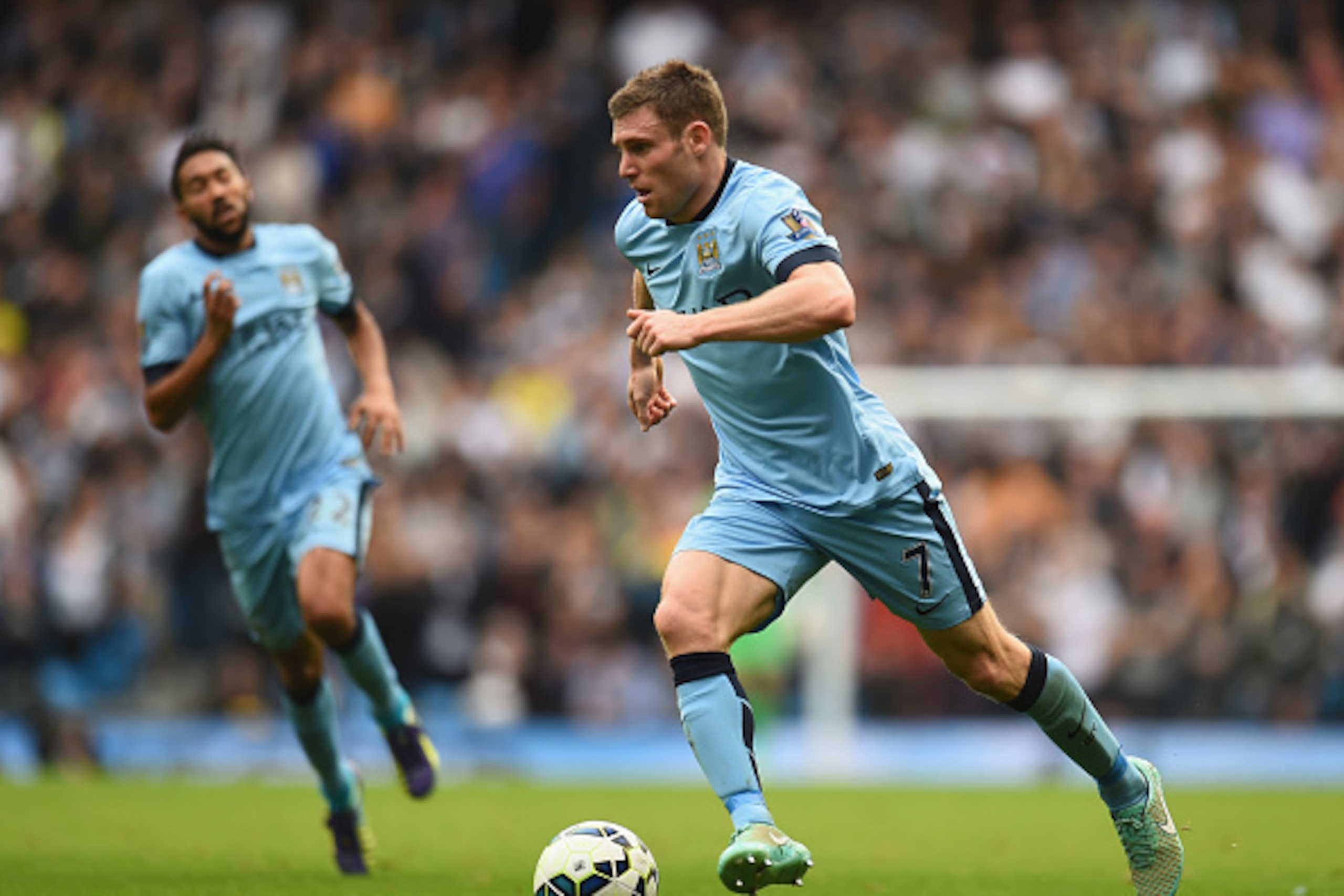 MANCHESTER, ENGLAND - OCTOBER 18:  James Milner of Manchester City in action during the Barclays Premier League match between Manchester City and Tottenham Hotspur at Etihad Stadium on October 18, 2014 in Manchester, England.  (Photo by Shaun Botterill/Ge