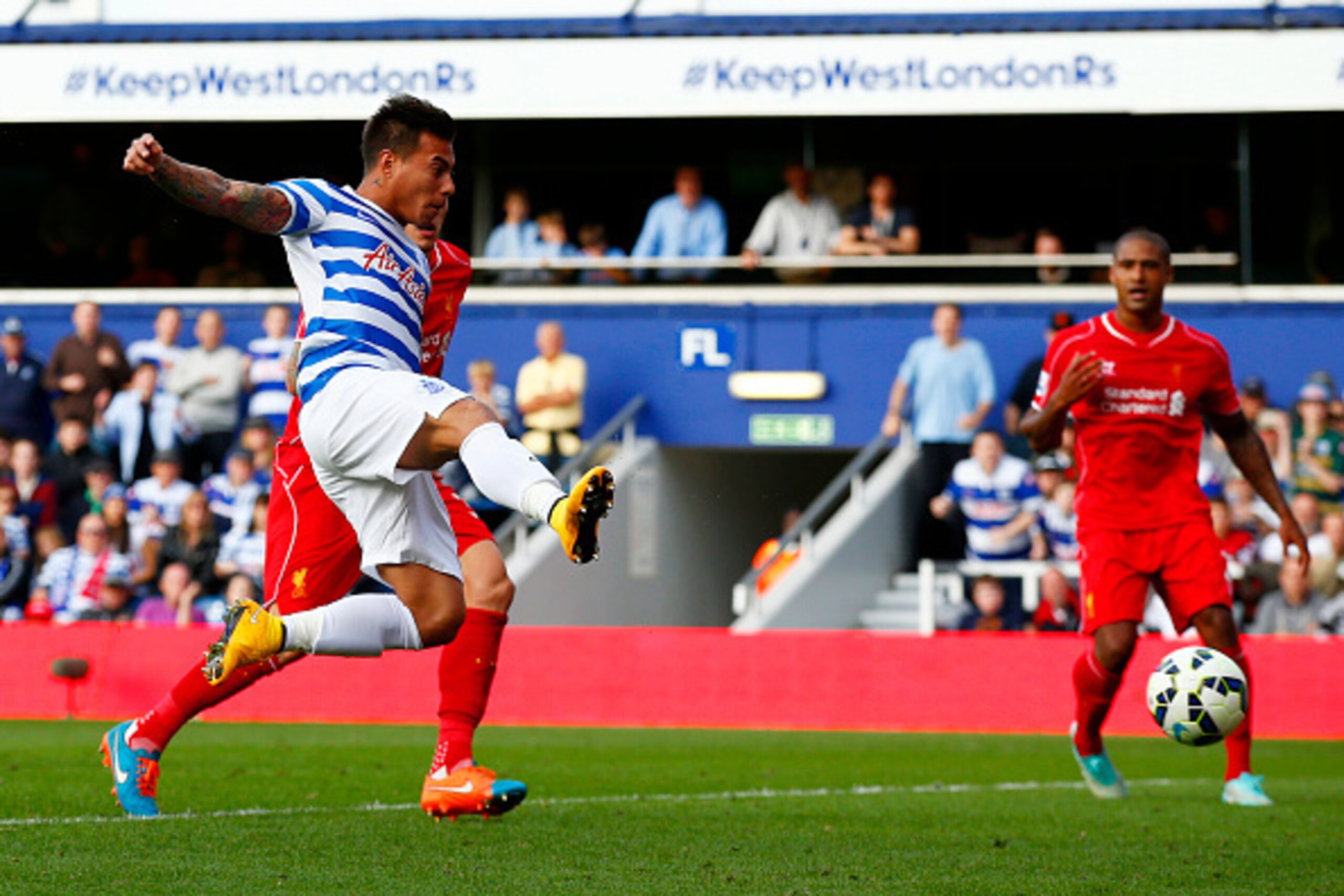 LONDON, ENGLAND - OCTOBER 19:  Eduardo Vargas of QPR scores his team's first goal during the Barclays Premier League match between Queens Park Rangers and Liverpool at Loftus Road on October 19, 2014 in London, England.  (Photo by Clive Rose/Getty Images)