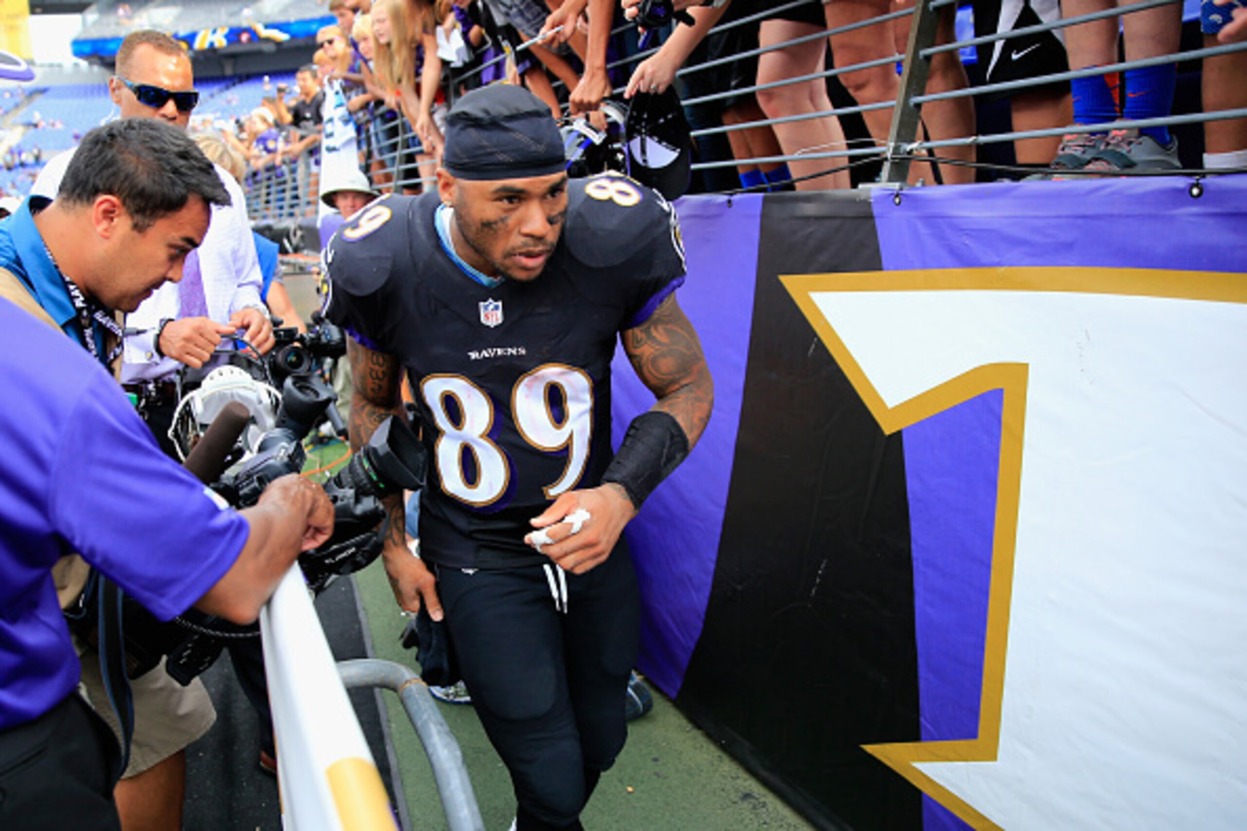 BALTIMORE, MD - SEPTEMBER 28: Wide receiver Steve Smith #89 of the Baltimore Ravens heads for the locker room after the Ravens defeated the Panthers 38-10 at M&T Bank Stadium on September 28, 2014 in Baltimore, Maryland.  (Photo by Rob Carr/Getty Images)