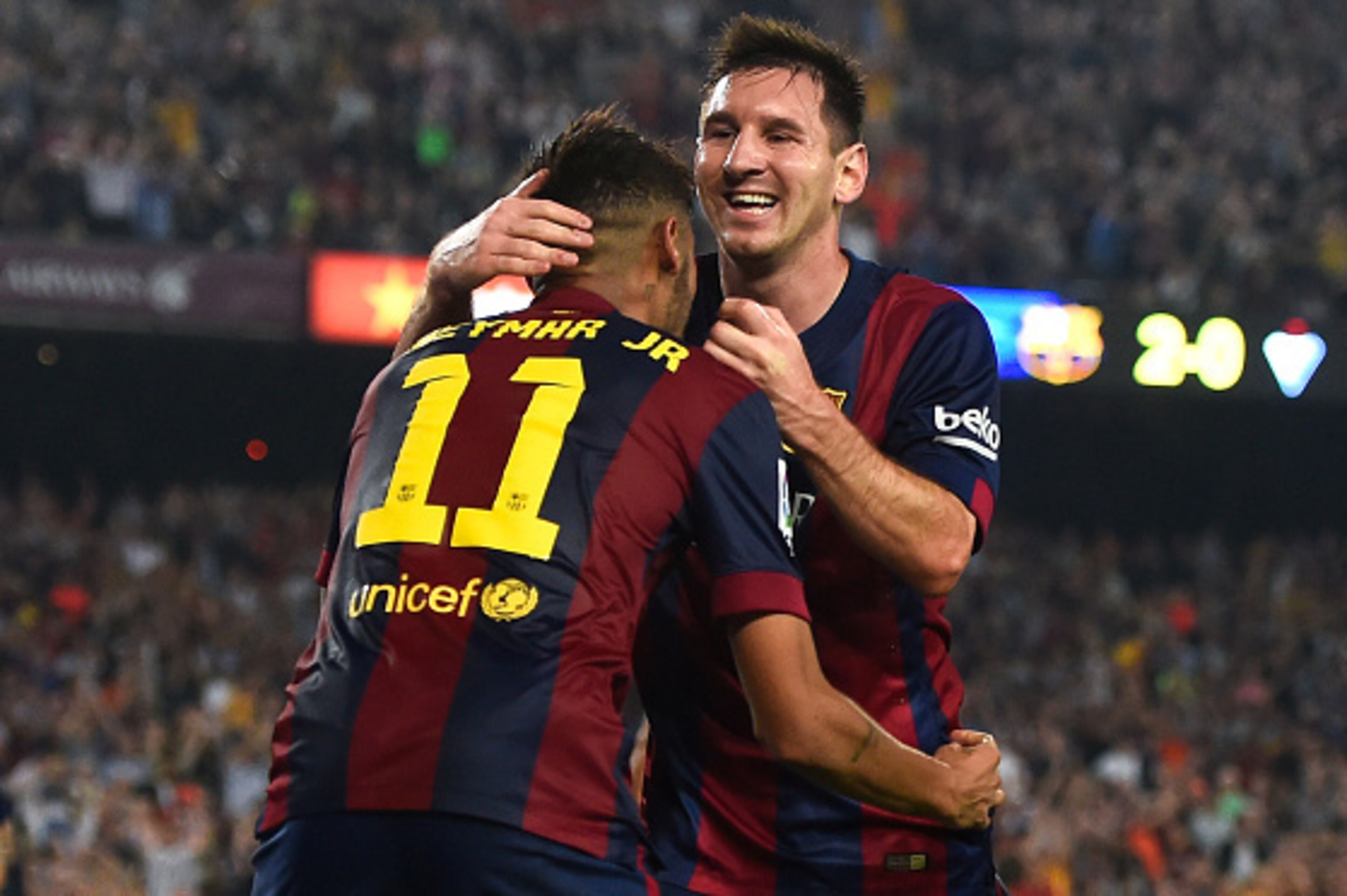 BARCELONA, SPAIN - OCTOBER 18:  Lionel Messi of FC Barcelona celebrates with his teammate Neymar of FC Barcelona after scoring his team's third goal during the La Liga match between FC Barcelona and SD Eibar at Camp Nou on October 18, 2014 in Barcelona, S