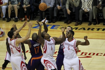 Oct 13, 2014; Houston, TX, USA; Houston Rockets forward Joey Dorsey (8) attempts to get a loose ball during the first quarter against the Phoenix Suns at Toyota Center. Mandatory Credit: Troy Taormina-USA TODAY Sports