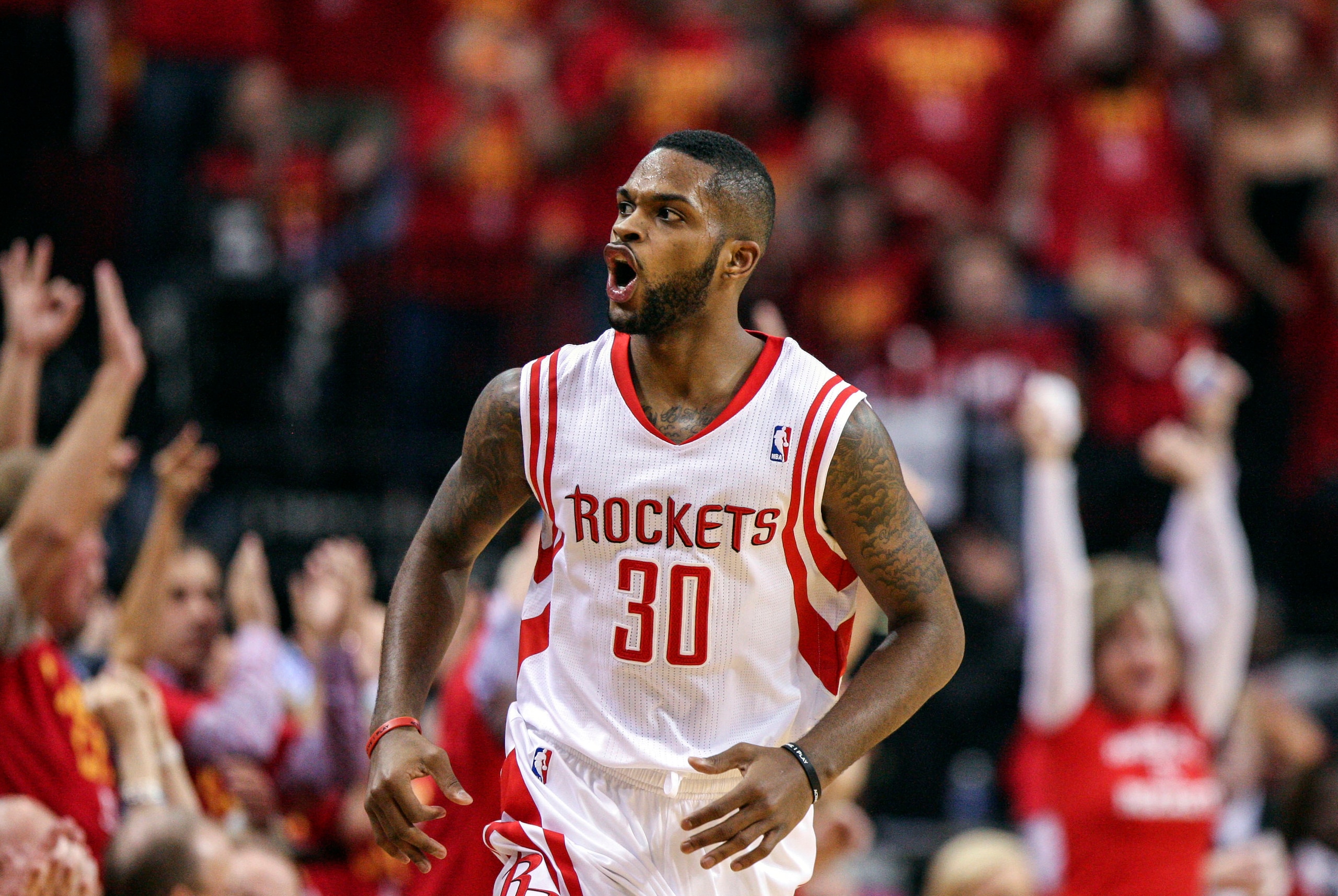 Apr 30, 2014; Houston, TX, USA; Houston Rockets guard Troy Daniels (30) reacts after making a basket during the second quarter against the Portland Trail Blazers in game five of the first round of the 2014 NBA Playoffs at Toyota Center. Mandatory Credit: