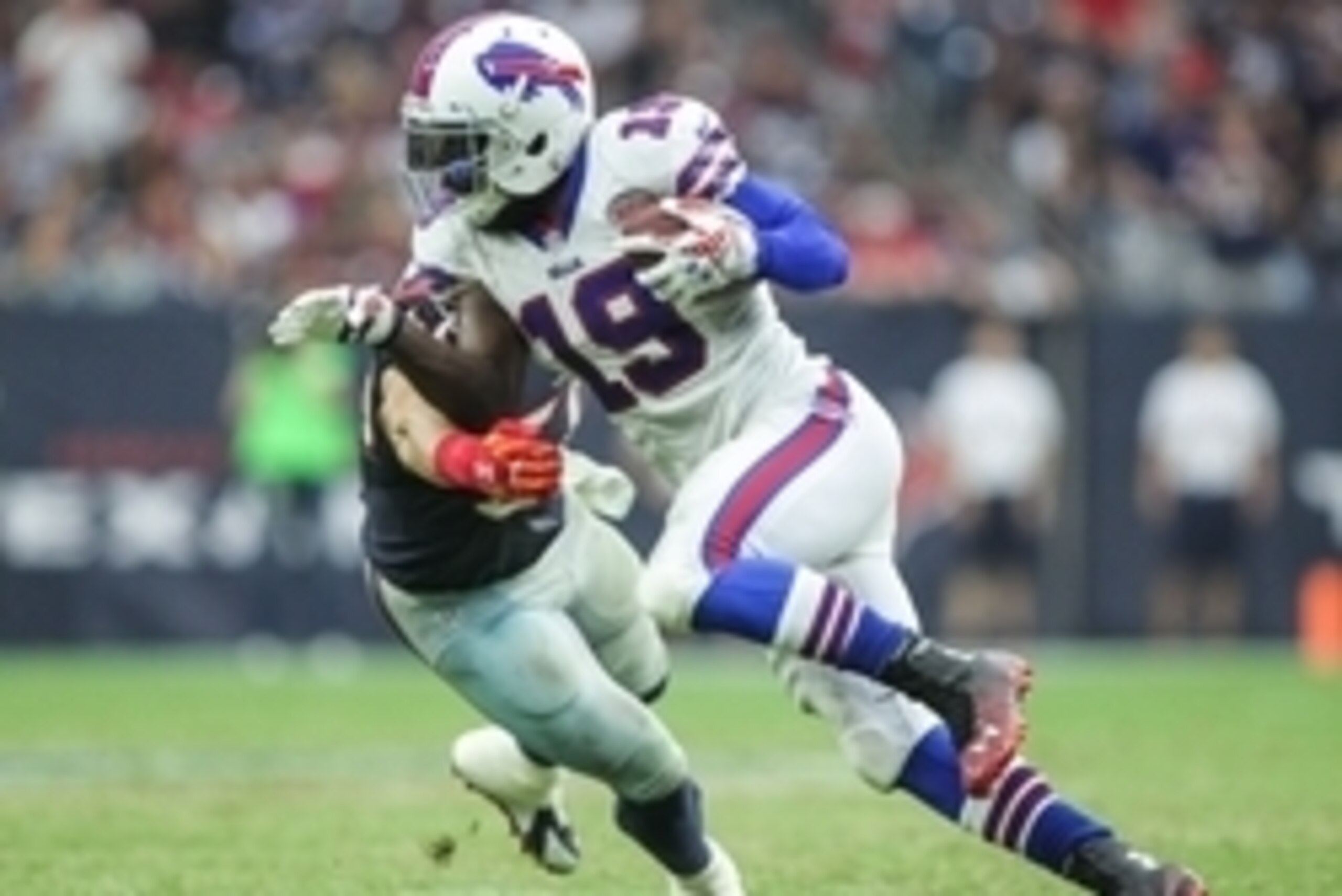 Sep 28, 2014; Houston, TX, USA; Buffalo Bills wide receiver Mike Williams (19) runs with the ball in a game against the Houston Texans at NRG Stadium. Mandatory Credit: Troy Taormina-USA TODAY Sports