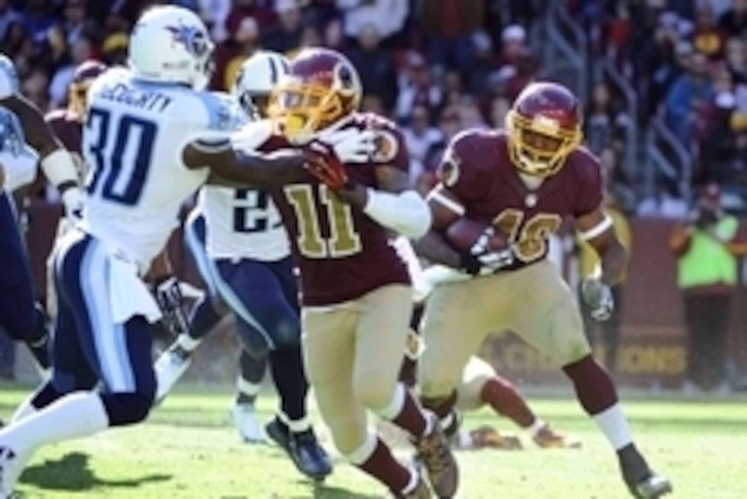 Oct 19, 2014; Landover, MD, USA; Washington Redskins running back Alfred Morris (46) rushes the ball against the Tennessee Titans during the second half at FedEx Field. Mandatory Credit: Brad Mills-USA TODAY Sports