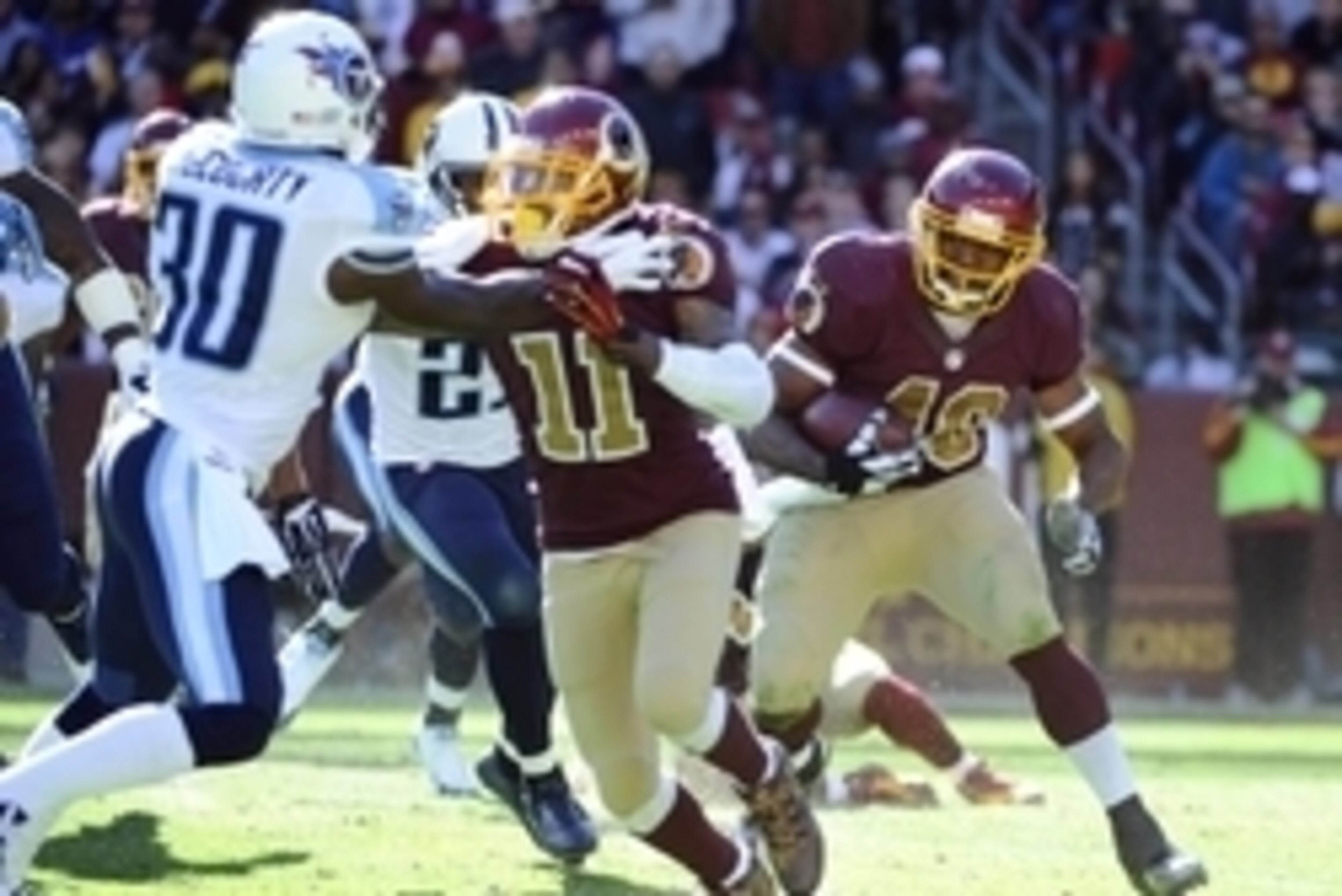 Oct 19, 2014; Landover, MD, USA; Washington Redskins running back Alfred Morris (46) rushes the ball against the Tennessee Titans during the second half at FedEx Field. Mandatory Credit: Brad Mills-USA TODAY Sports