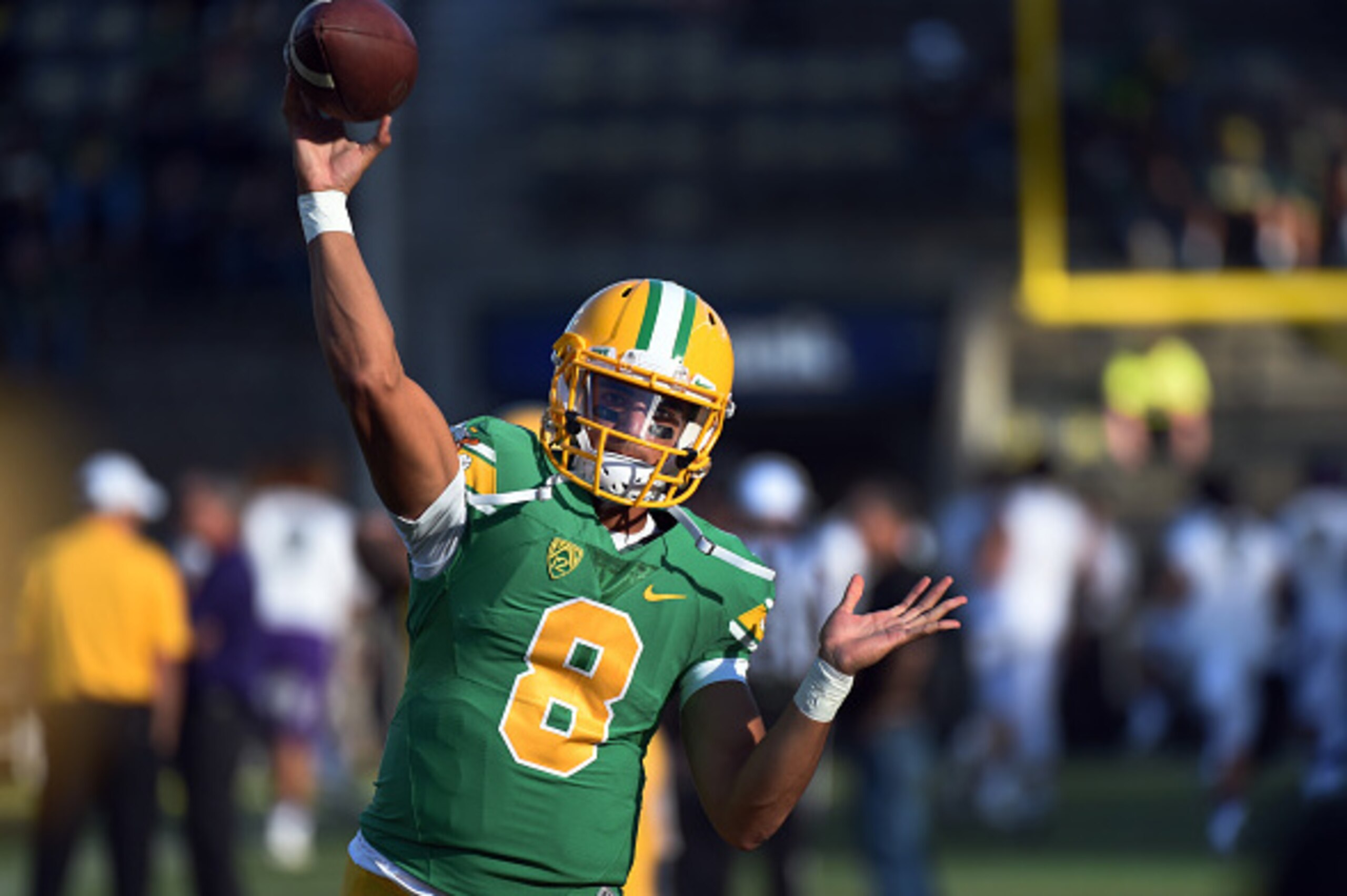 EUGENE,OR - OCTOBER 18: Quarterback Marcus Mariota #8 of the Oregon Ducks warms up before the game against the Washington Huskies at Autzen Stadium on October 18, 2014 in Eugene, Oregon. (Photo by Steve Dykes/Getty Images)