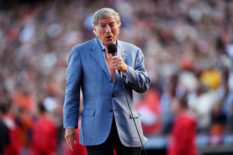 SAN FRANCISCO, CA - OCTOBER 06:  Singer Tony Bennett sings 'God Bless America' after the seventh inning of Game Three of the National League Division Series between the San Francisco Giants and the Washington Nationals at AT&T Park on October 6, 2014 in S