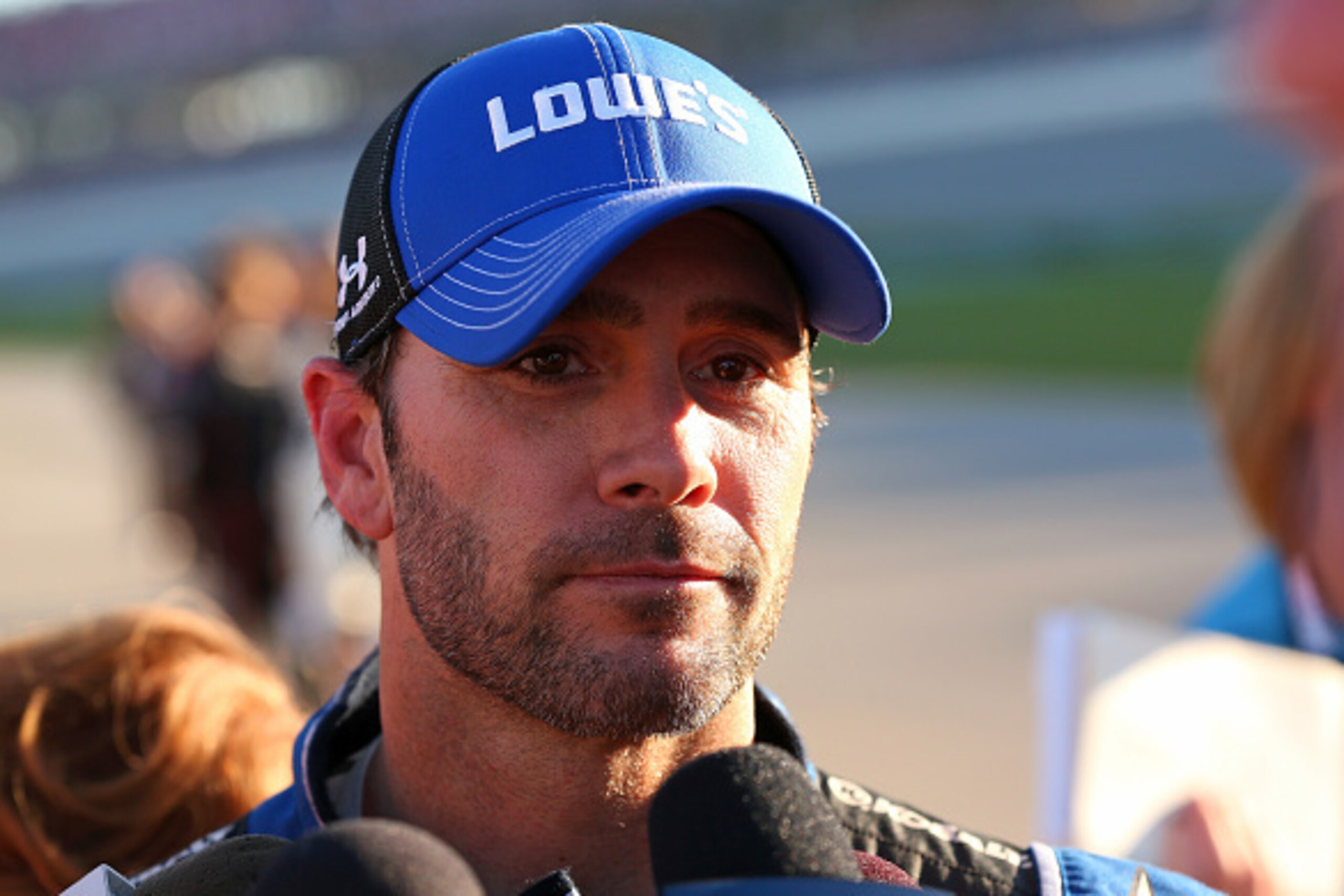 TALLADEGA, AL - OCTOBER 19:  Jimmie Johnson, driver of the #48 Lowe's Chevrolet, talks with the media following the NASCAR Sprint Cup Series GEICO 500 at Talladega Superspeedway on October 19, 2014 in Talladega, Alabama.  (Photo by Mike Ehrmann/Getty Imag