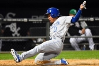 Sep 25, 2014; Chicago, IL, USA; Kansas City Royals base runner Terrance Gore (0) scores a run against the Chicago White Sox during the eighth inning at U.S Cellular Field. Kansas City defeats Chicago 6-3. Mandatory Credit: Mike DiNovo-USA TODAY Sports