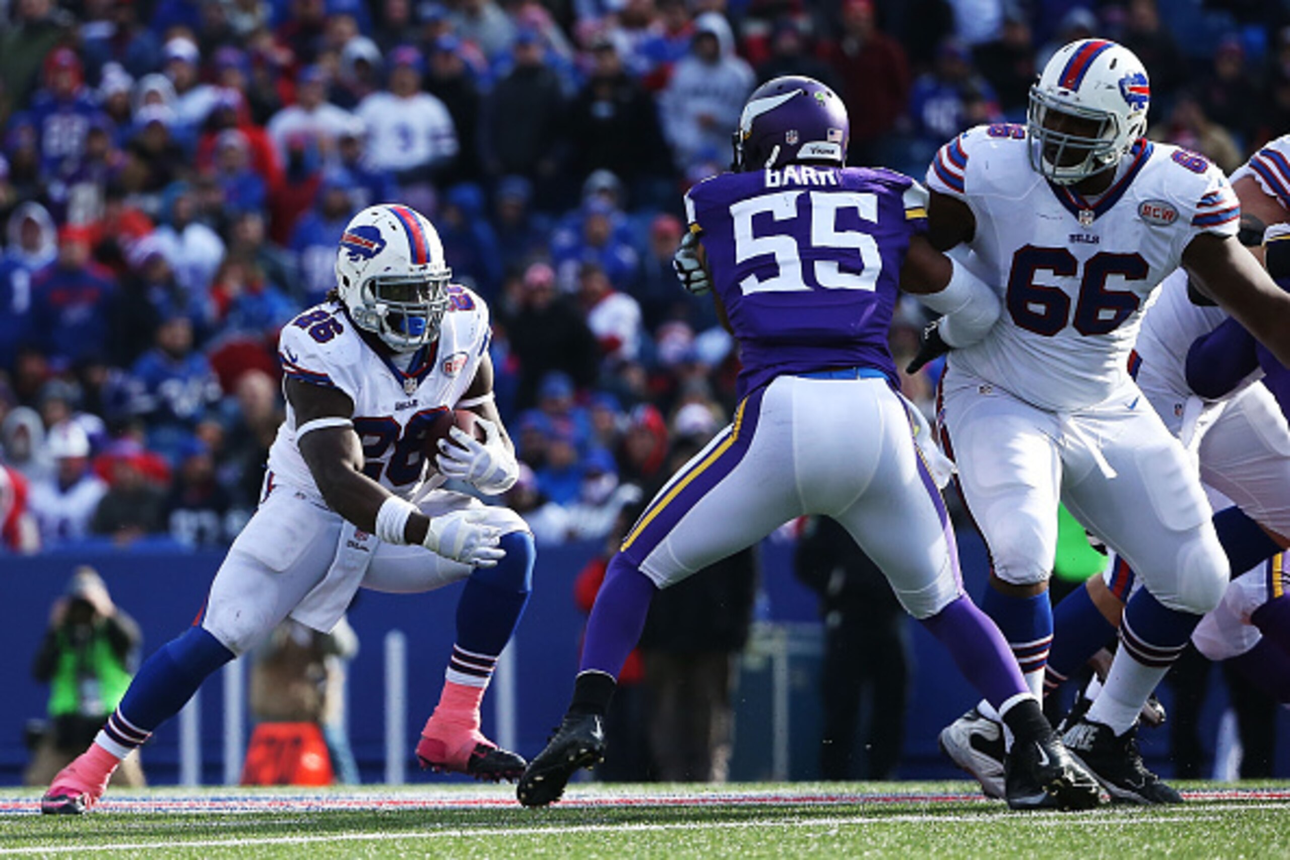 ORCHARD PARK, NY - OCTOBER 19:   Anthony Dixon #26 of the Buffalo Bills runs against the Minnesota Vikings during the second half at Ralph Wilson Stadium on October 19, 2014 in Orchard Park, New York.  (Photo by Tom Szczerbowski/Getty Images)