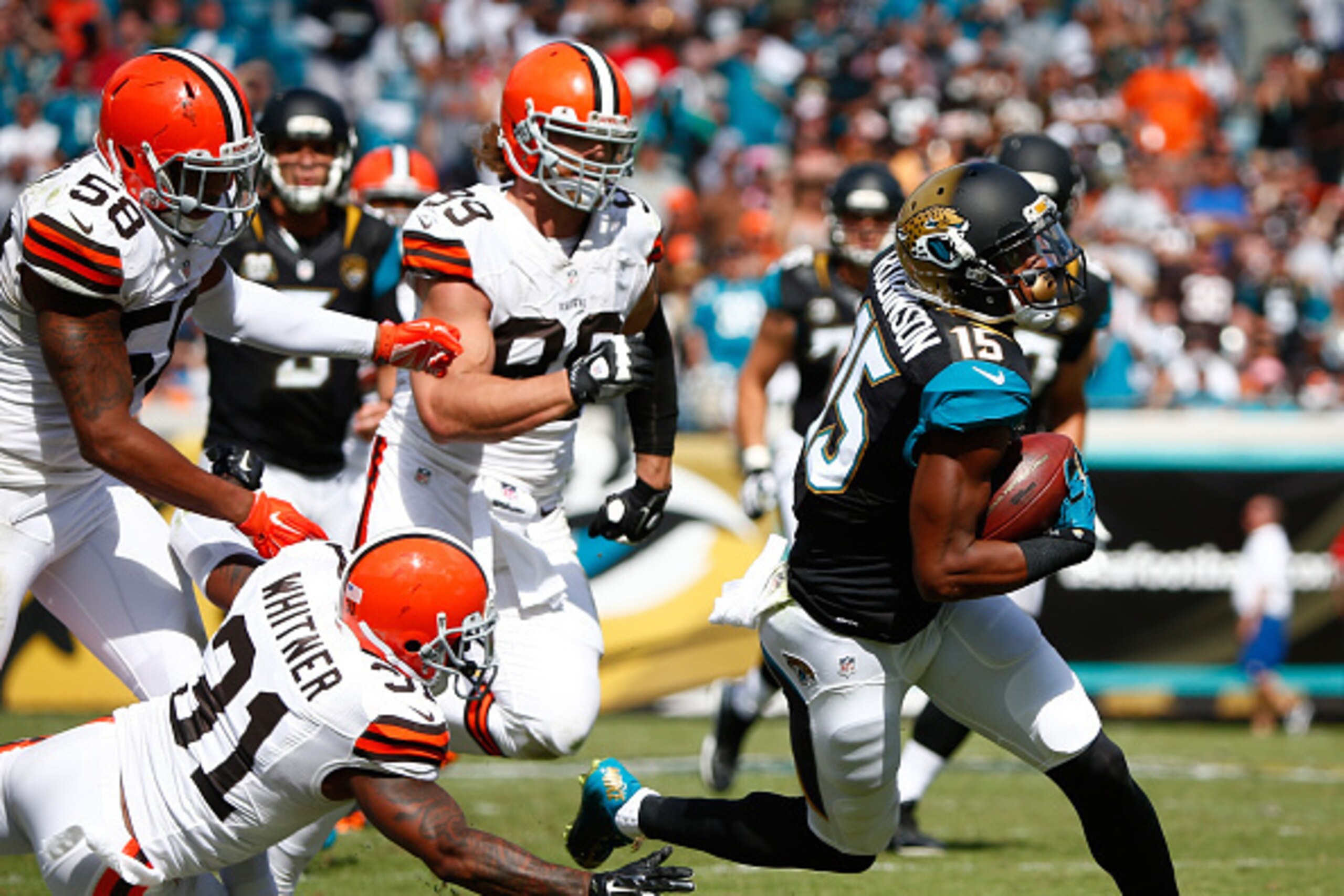 JACKSONVILLE, FL - OCTOBER 19:  Allen Robinson #15 of the Jacksonville Jaguars runs for yardage during the game against the Cleveland Browns at EverBank Field on October 19, 2014 in Jacksonville, Florida.  (Photo by Sam Greenwood/Getty Images)