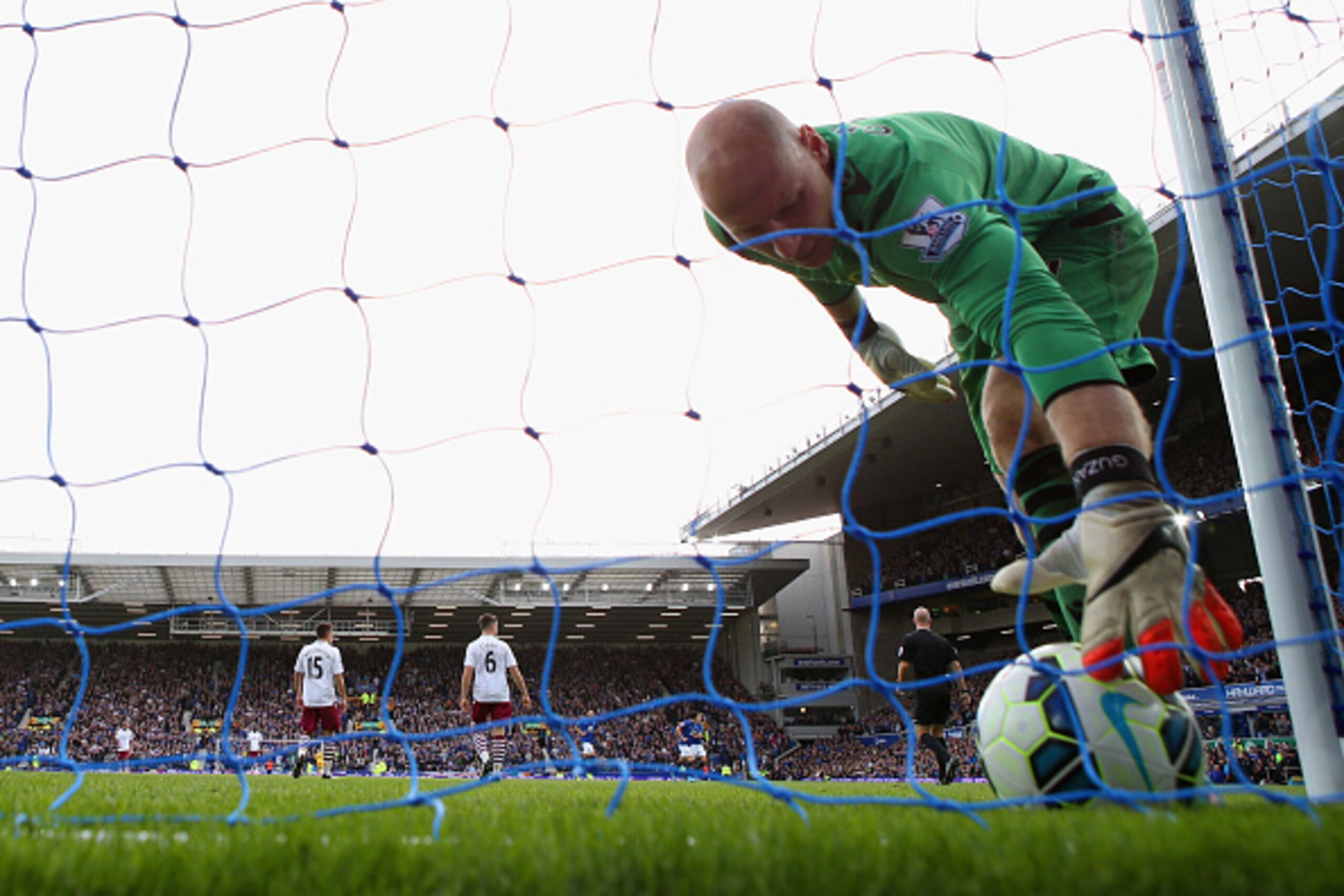 LIVERPOOL, ENGLAND - OCTOBER 18:  Brad Guzan of Aston Villa picks the ball out of the net after Romelu Lukaku of Everton (not pictured) scores their second goal during the Barclays Premier League match between Everton and Aston Villa at Goodison Park on O