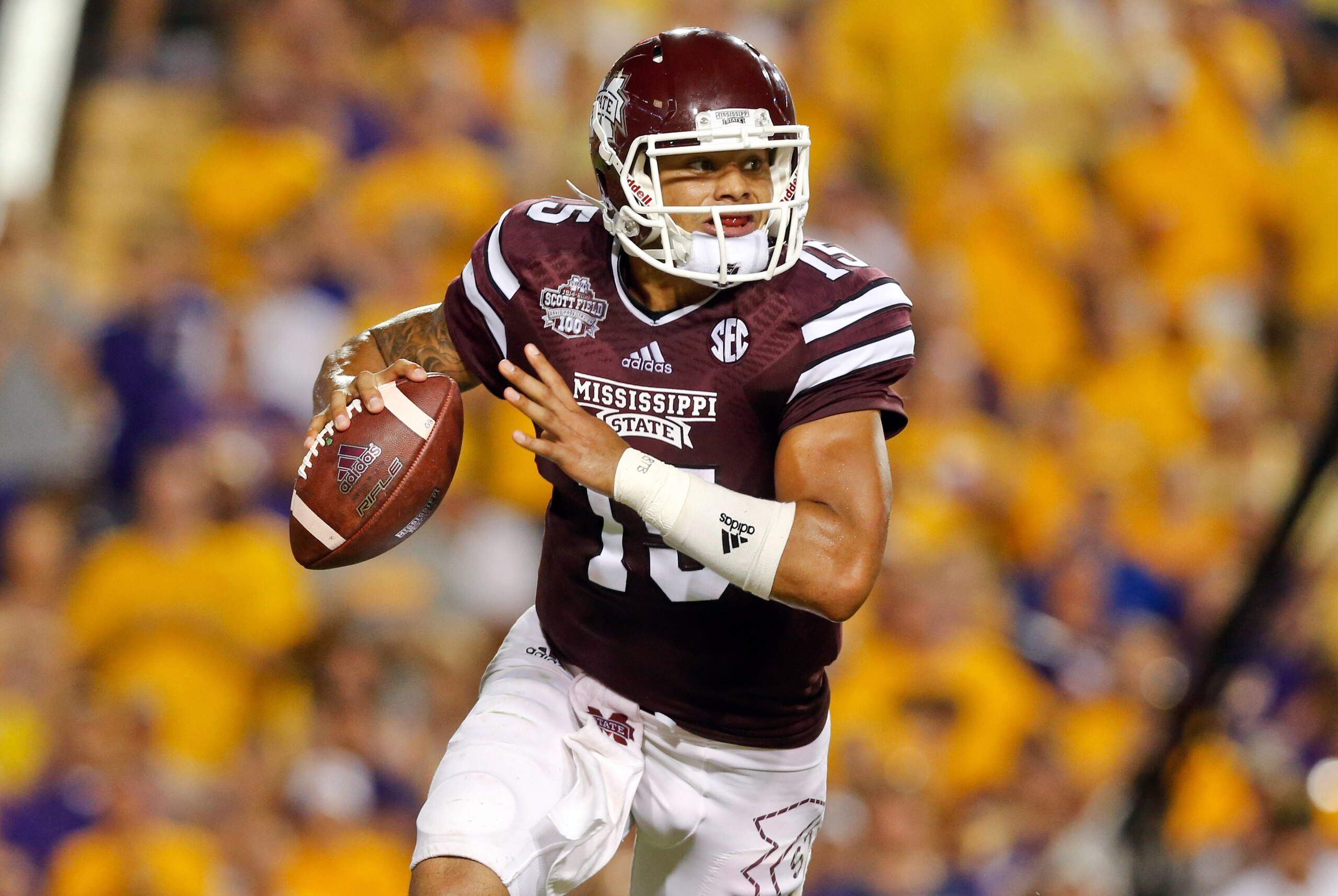 Sep 20, 2014; Baton Rouge, LA, USA; Mississippi State Bulldogs quarterback Dak Prescott (15) looks to pass against the LSU Tigers during the third quarter of a game at Tiger Stadium. Mandatory Credit: Derick E. Hingle-USA TODAY Sports