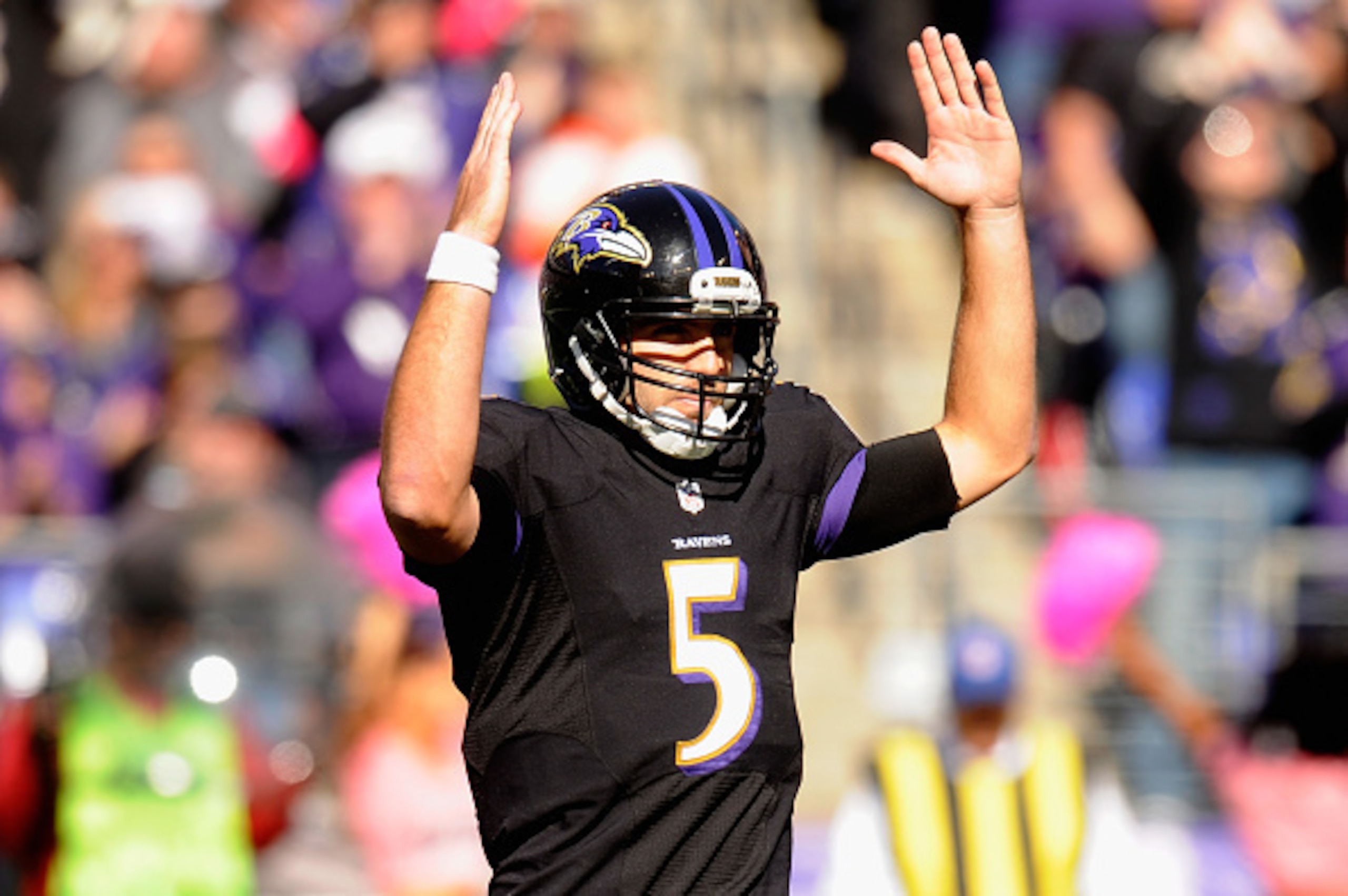 BALTIMORE, MD - OCTOBER 19: Quarterback Joe Flacco #5 of the Baltimore Ravens signals after a second quarter touchdown against the Atlanta Falcons at M&T Bank Stadium on October 19, 2014 in Baltimore, Maryland. (Photo by Mitchell Layton/Getty Images) BALTIMORE, MD - OCTOBER 19: Quarterback Joe Flacco #5 of the Baltimore Ravens signals after a second quarter touchdown against the Atlanta Falcons at M&T Bank Stadium on October 19, 2014 in Baltimore, Maryland. (Photo by Mitchell Layton/Getty Images)