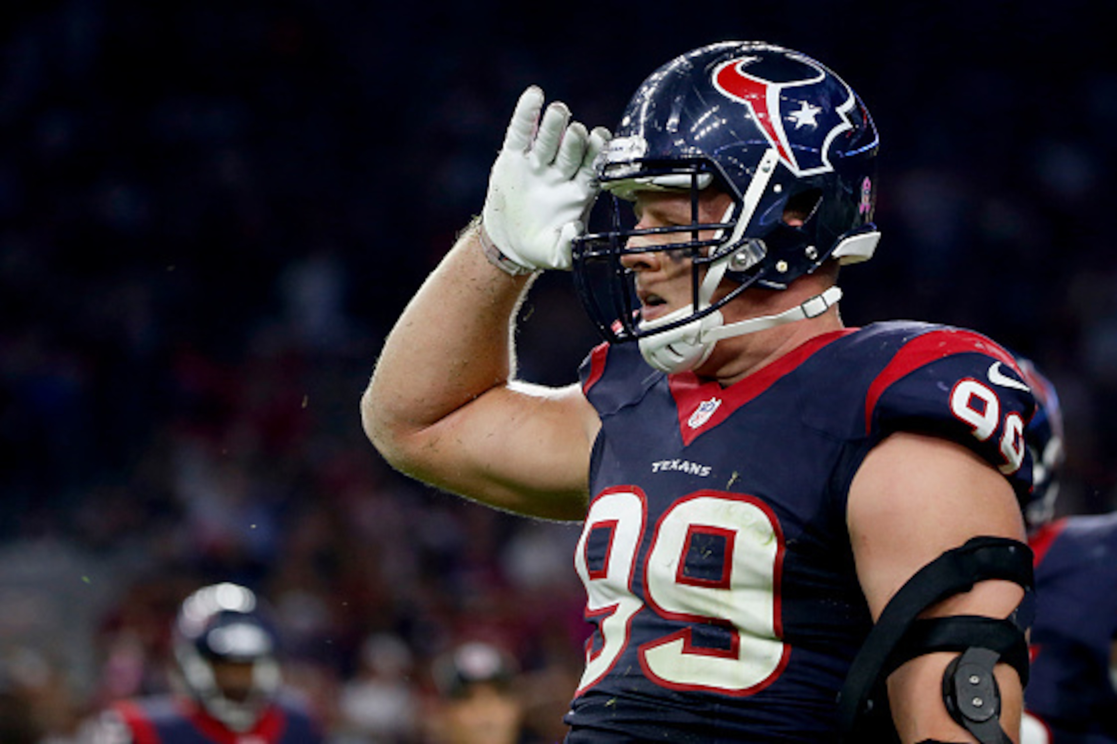 HOUSTON, TX- OCTOBER 09: J.J. Watt #99 of the Houston Texans salutes after knocking down a pass by quarterback Andrew Luck #12 of the Indianapolis Colts in the first quarter in a NFL game on October 9, 2014 at NRG Stadium in Houston, Texas. (Photo by Scot HOUSTON, TX- OCTOBER 09: J.J. Watt #99 of the Houston Texans salutes after knocking down a pass by quarterback Andrew Luck #12 of the Indianapolis Colts in the first quarter in a NFL game on October 9, 2014 at NRG Stadium in Houston, Texas. (Photo by Scot