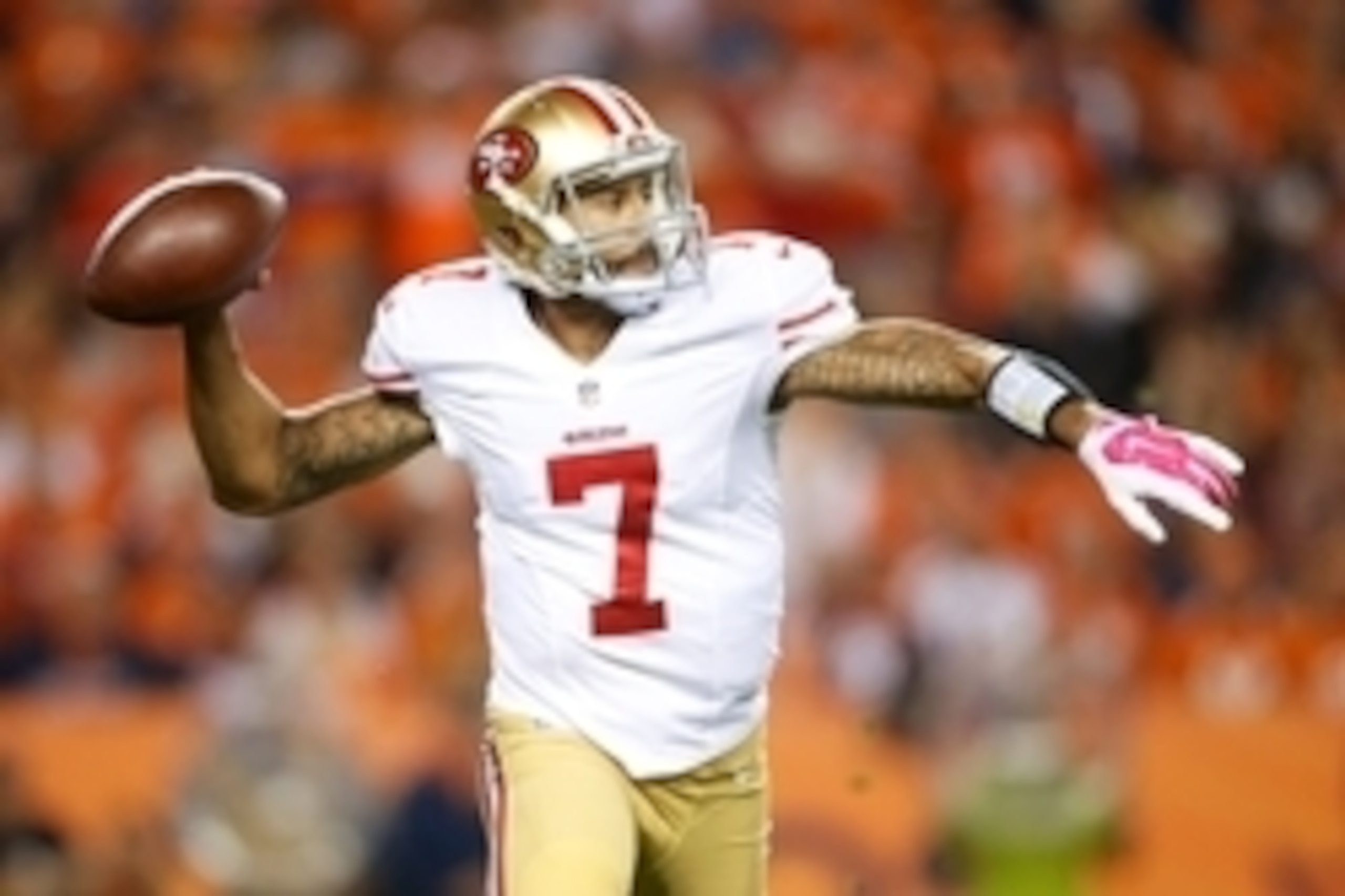 Oct 19, 2014; Denver, CO, USA; San Francisco 49ers quarterback Colin Kaepernick (7) in the second quarter against the Denver Broncos at Sports Authority Field at Mile High. Mandatory Credit: Chris Humphreys-USA TODAY Sports