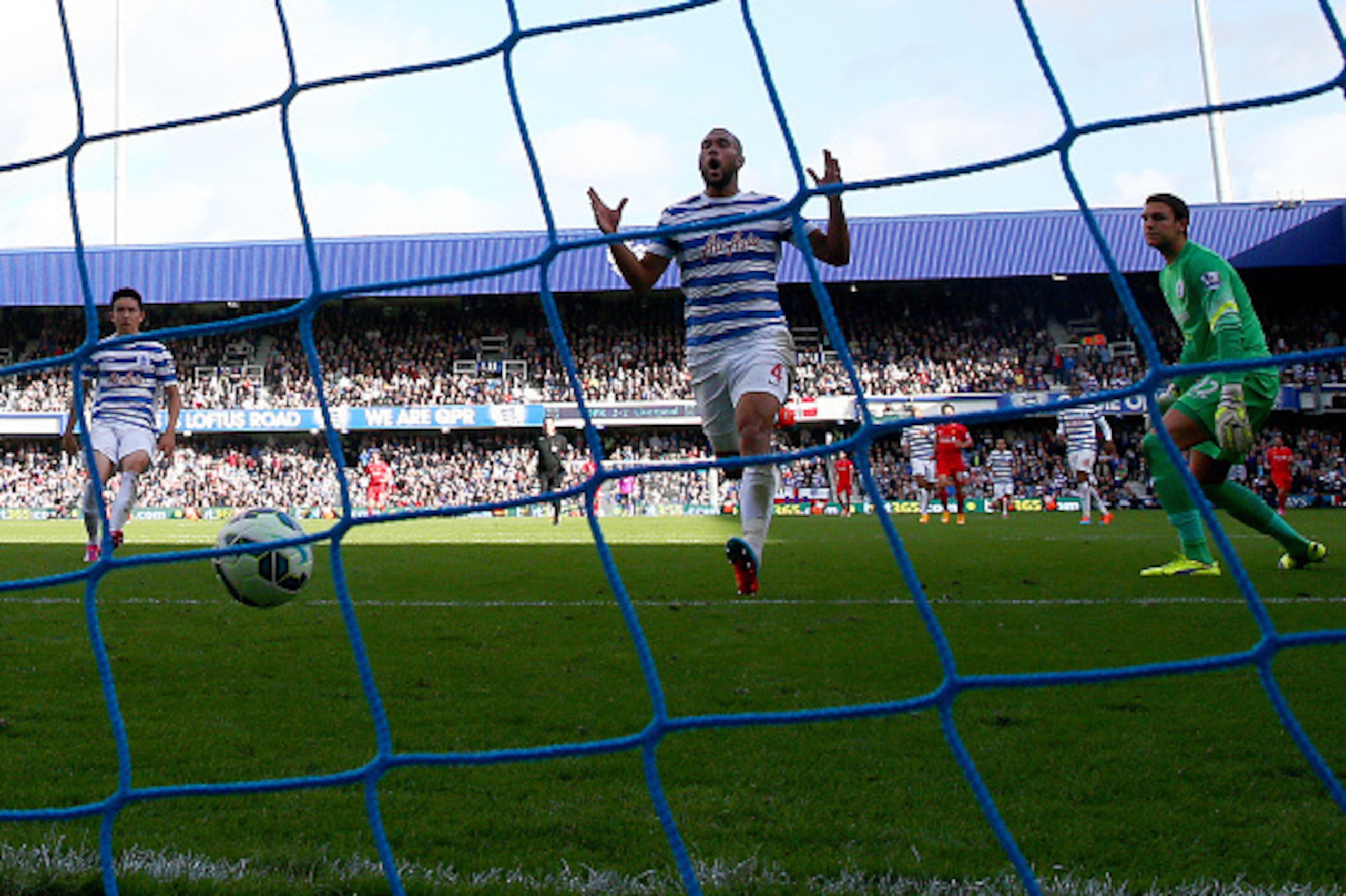 LONDON, ENGLAND - OCTOBER 19:  Steven Caulker of QPR reacts after scoring an own goal during the Barclays Premier League match between Queens Park Rangers and Liverpool at Loftus Road on October 19, 2014 in London, England.  (Photo by Paul Gilham/Getty Im