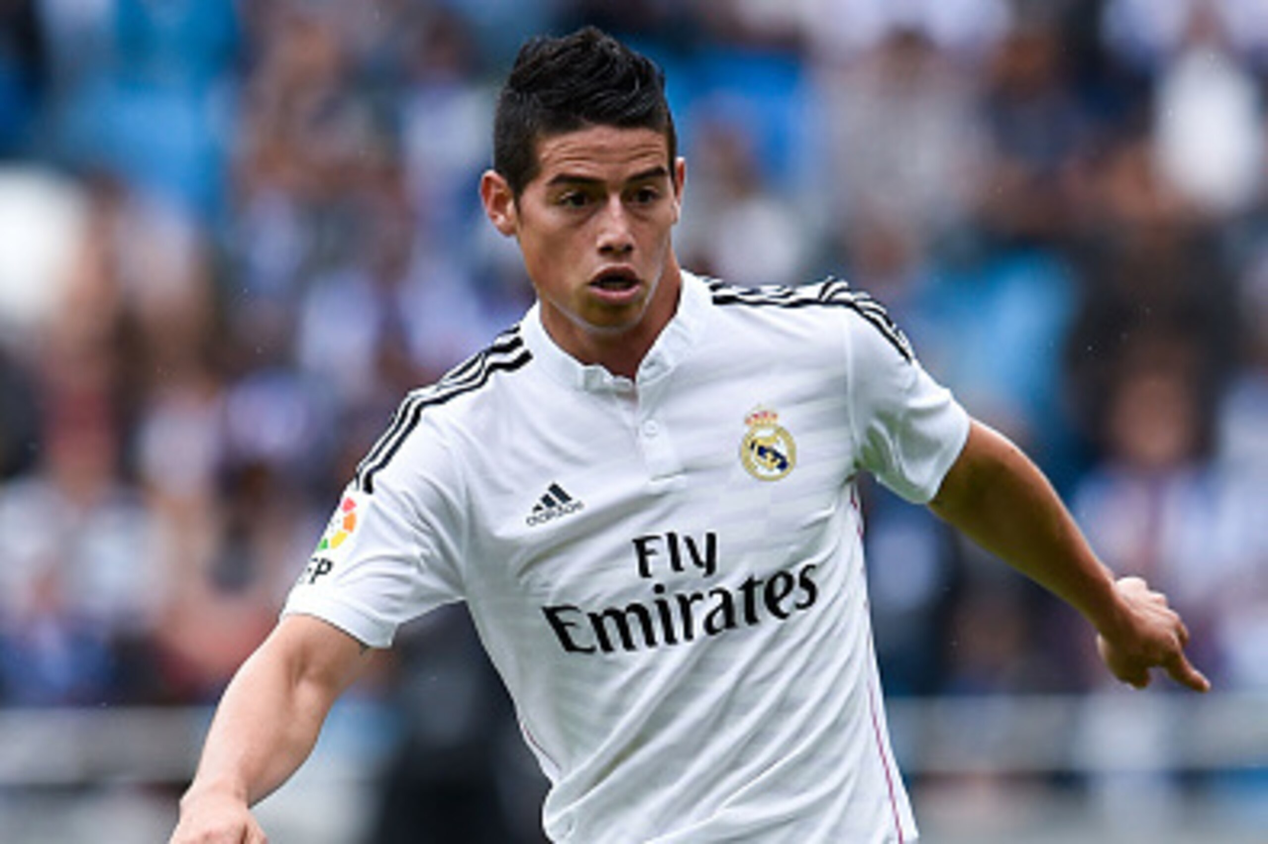 LA CORUNA, SPAIN - SEPTEMBER 20:  James Rodriguez of Real Madrid CF runs with the ball during the La Liga match between RC Deportivo La Coruna and Real Madrid CF at Riazor Stadium on September 20, 2014 in La Coruna, Spain.  (Photo by David Ramos/Getty Ima