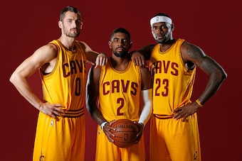 INDEPENDENCE, OH - SEPTEMBER 26:  Kevin Love #0, Kyrie Irving #2 and LeBron James #23 of the Cleveland Cavaliers poses for a photo during media day on September 26, 2014 at the Cleveland Clinic Courts in Independence, Ohio.  NOTE TO USER: User expressly a