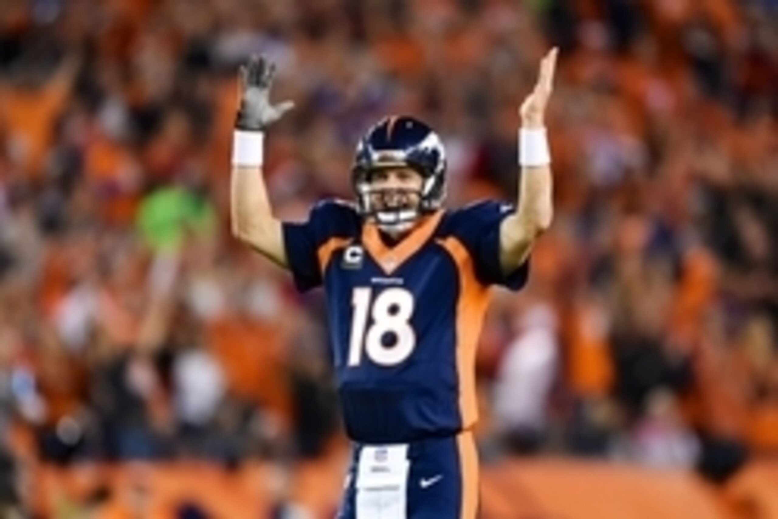 Oct 19, 2014; Denver, CO, USA; Denver Broncos quarterback Peyton Manning (18) reacts after throwing his second touchdown pass in the first quarter against the San Francisco 49ers at Sports Authority Field at Mile High. Mandatory Credit: Ron Chenoy-USA TOD