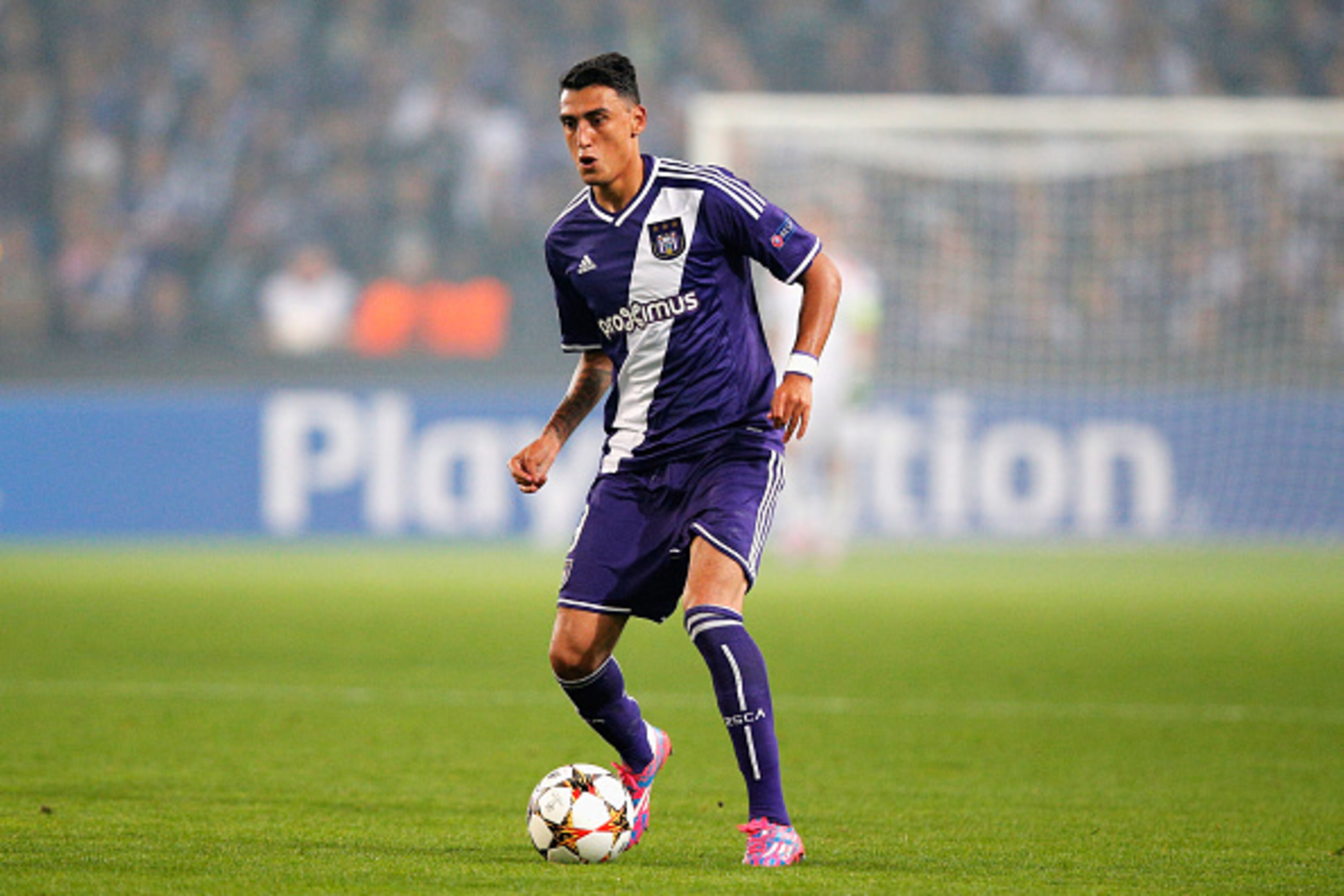 ANDERLECHT, BELGIUM - OCTOBER 01: Matias Suarez of Anderlecht in action during the Group D UEFA Champions League match between RSC Anderlecht and Borussia Dortmund held at Constant Vanden Stock Stadium on October 1, 2014 in Anderlecht, Belgium. (Photo b ANDERLECHT, BELGIUM - OCTOBER 01: Matias Suarez of Anderlecht in action during the Group D UEFA Champions League match between RSC Anderlecht and Borussia Dortmund held at Constant Vanden Stock Stadium on October 1, 2014 in Anderlecht, Belgium. (Photo b
