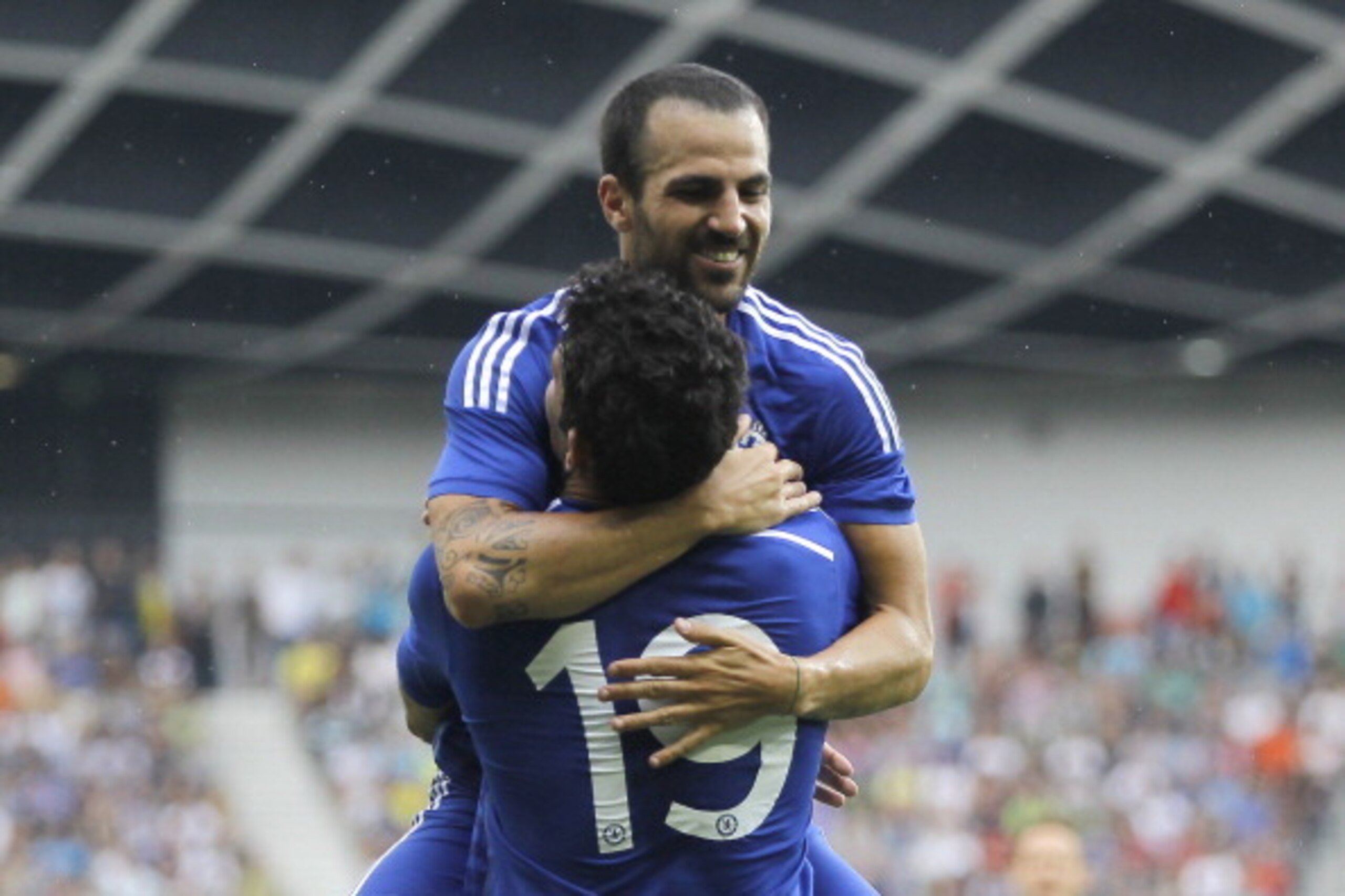 LJUBLJANA, SLOVENIA - JULY 27: Diego Costa of Chelsea celebrate the scoring the goal with Cesc Fabregas (TOP) during the Pre Season Friendly  match between FC Olimpija Ljubljana and Chelsea at Stozice stadium in Ljubljana, Slovenia on Sunday, July 27, 201