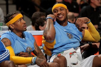 DENVER - APRIL 16:  Allen Iverson #3 and Carmelo Anthony #15 of the Denver Nuggets check out of the game in the third quarter against the Memphis Grizzlies at the Pepsi Center on April 16, 2008 in Denver, Colorado. The Nuggets defeated the Grizzlies 120-1