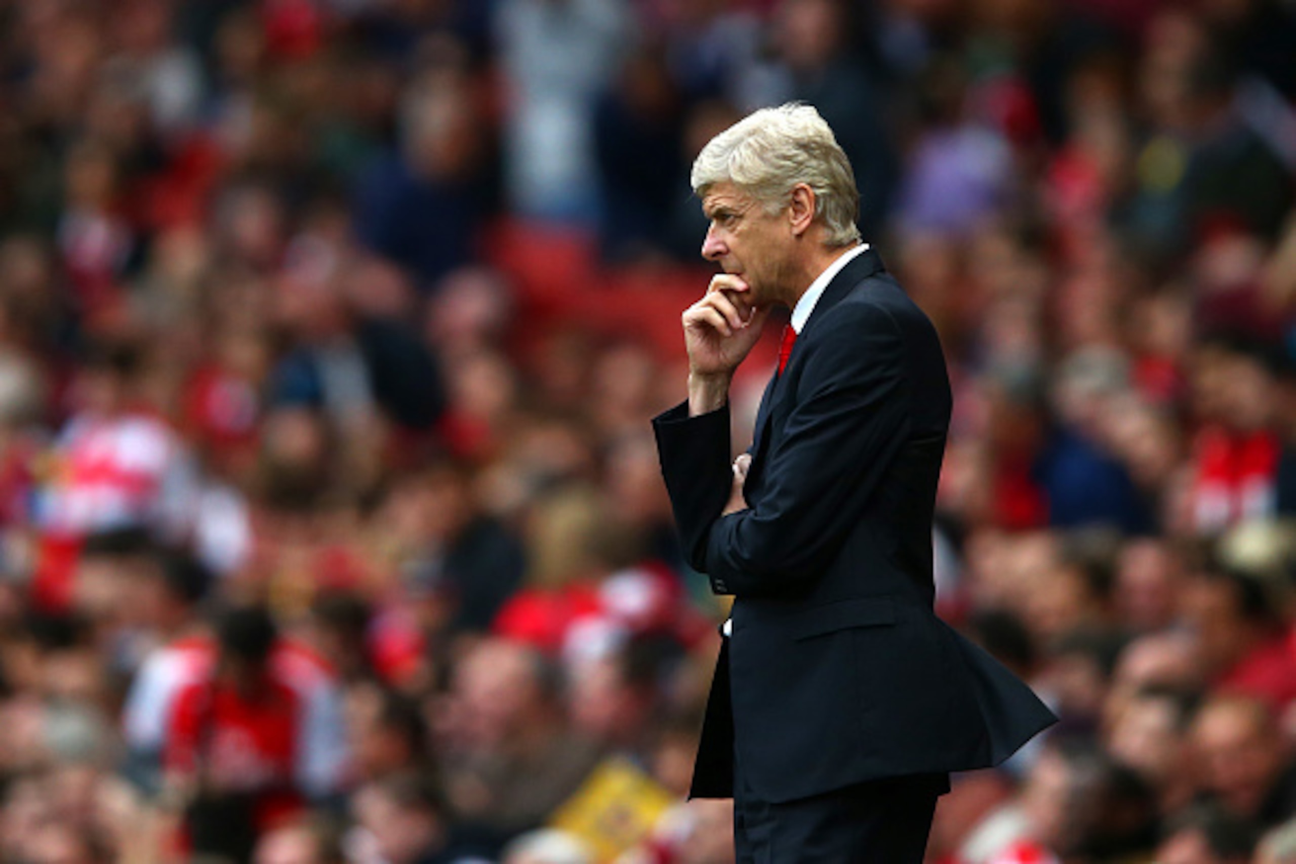 LONDON, ENGLAND - OCTOBER 18:  Arsene Wenger, manager of Arsenal looks on during the Barclays Premier League match between Arsenal and Hull City at Emirates Stadium on October 18, 2014 in London, England.  (Photo by Clive Rose/Getty Images)
