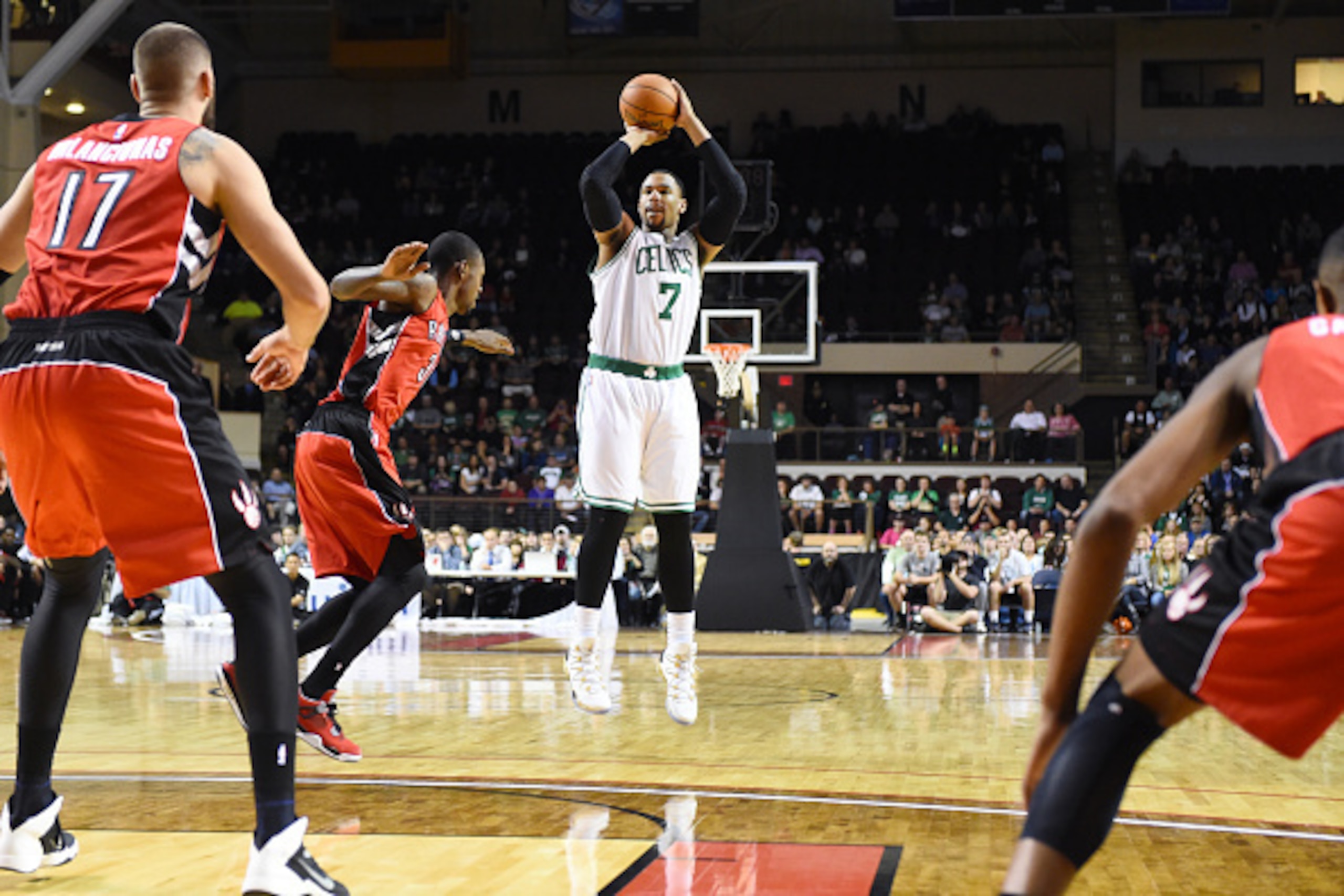 PORTLAND, ME - OCTOBER 15: Jared Sullinger #7 of the Boston Celtics shoots against the Toronto Raptors during the preseason game on October 15, 2014 at the Cross Insurance Arena in Portland, Maine. NOTE TO USER: User expressly acknowledges and agrees that PORTLAND, ME - OCTOBER 15: Jared Sullinger #7 of the Boston Celtics shoots against the Toronto Raptors during the preseason game on October 15, 2014 at the Cross Insurance Arena in Portland, Maine. NOTE TO USER: User expressly acknowledges and agrees that
