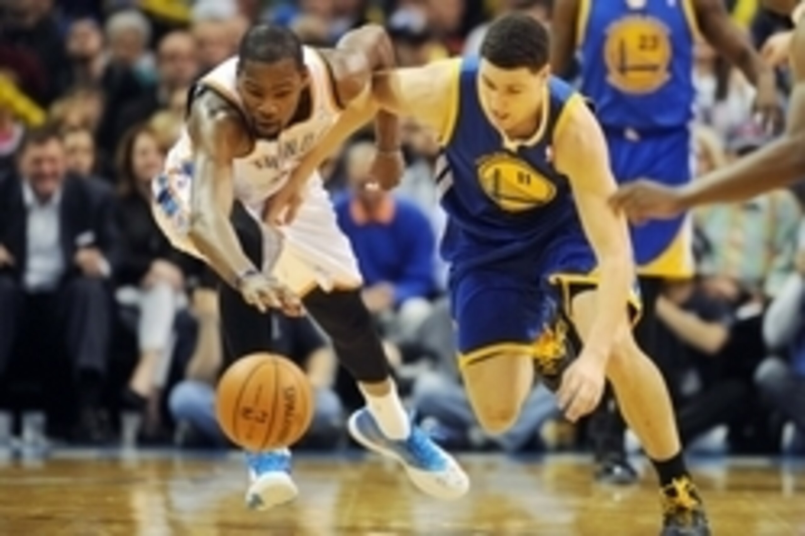 Jan 17, 2014; Oklahoma City, OK, USA; Oklahoma City Thunder small forward Kevin Durant (35) fights for a loose ball with Golden State Warriors shooting guard Klay Thompson (11) during the third quarter at Chesapeake Energy Arena. Mandatory Credit: Mark D.