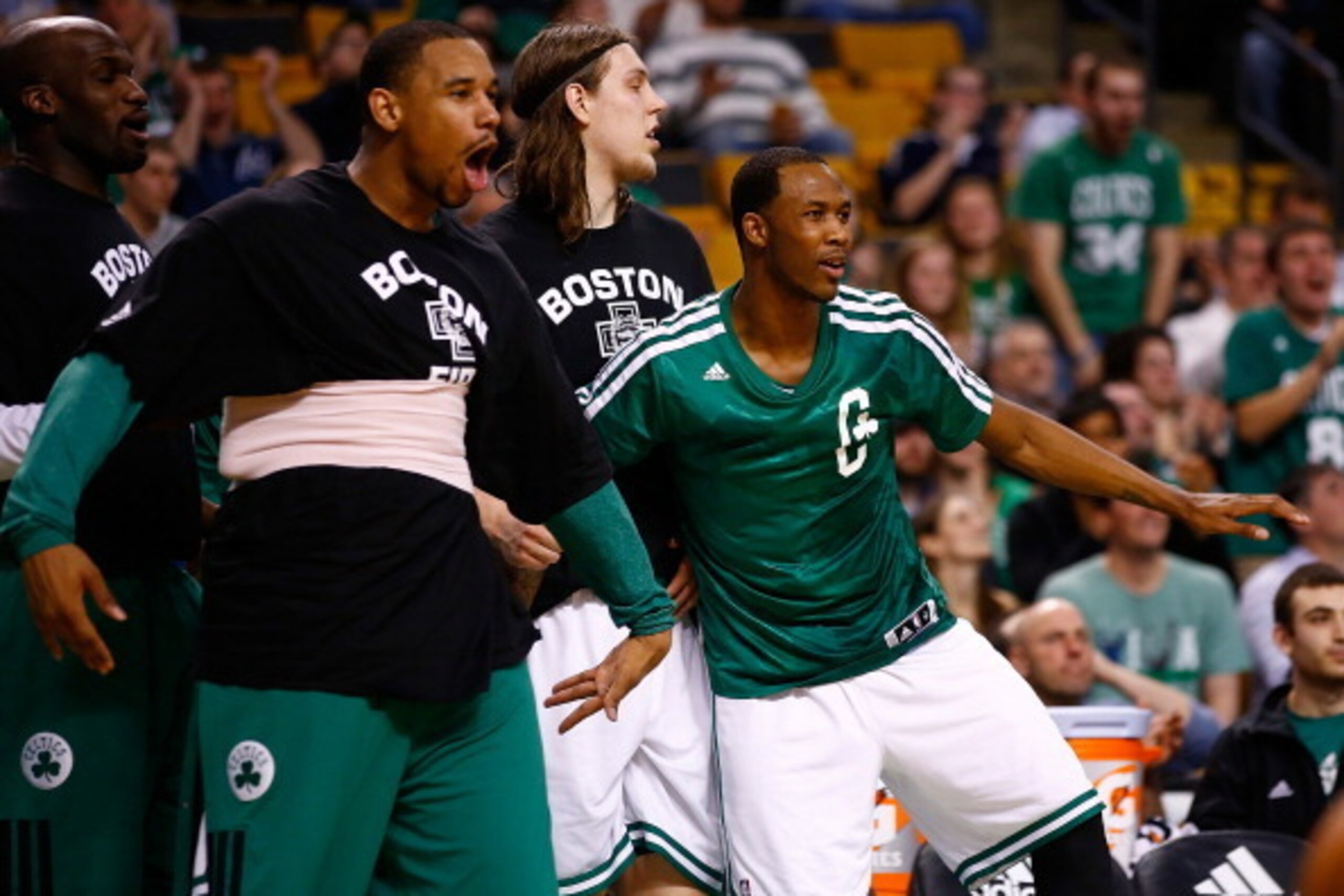 BOSTON, MA - MARCH 30: Jared Sullinger #7 and Chris Babb #52 of the Boston Celtics react to a dunk by teammate Brandon Bass #30 in the second quarter against the Chicago Bulls during the game at TD Garden on March 30, 2014 in Boston, Massachusetts. NOTE T BOSTON, MA - MARCH 30: Jared Sullinger #7 and Chris Babb #52 of the Boston Celtics react to a dunk by teammate Brandon Bass #30 in the second quarter against the Chicago Bulls during the game at TD Garden on March 30, 2014 in Boston, Massachusetts. NOTE T