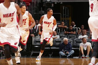 MIAMI, FL - OCTOBER 14:  Chris Bosh #1 of the Miami Heat runs down the court for a play against the Atlanta Hawks during the game on October 14, 2014 at AmericaAirlines Arena in Miami, Florida. NOTE TO USER: User expressly acknowledges and agrees that, by