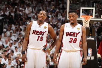 MIAMI, FL - JUNE 21:  Teammates Mario Chalmers #15 and Norris Cole #30 of the Miami Heat during Game Five of the 2012 NBA Finals at American Airlines Arena on June 21, 2012 in Miami, Florida. NOTE TO USER: User expressly acknowledges and agrees that, by d