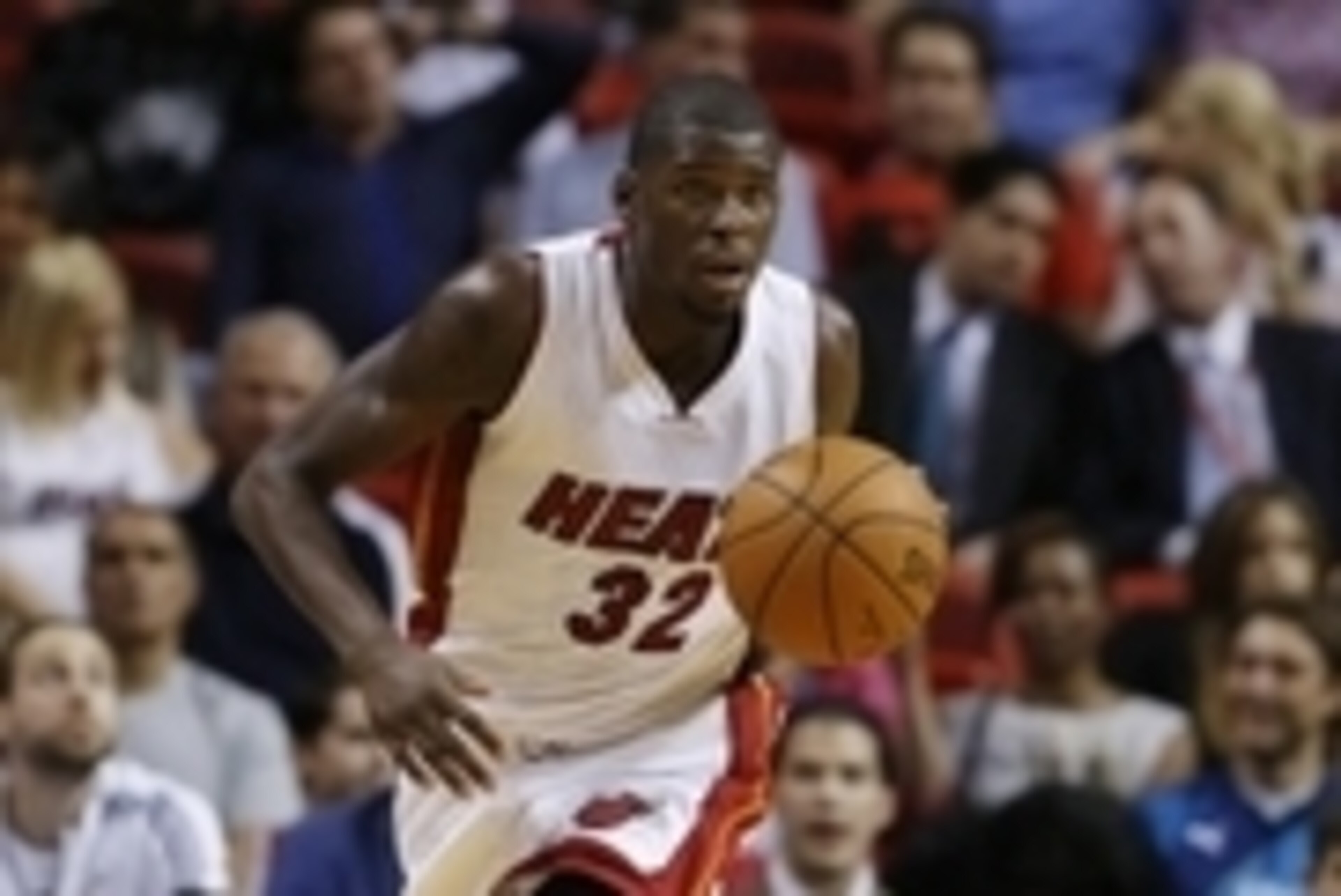 Oct 7, 2014; Miami, FL, USA;  Miami Heat forward James Ennis (32) dribbles the ball in the second half of a game against the Orlando Magic at American Airlines Arena. The Magic won 108-101in over time. Mandatory Credit: Robert Mayer-USA TODAY Sports