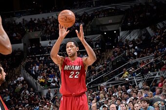 SAN ANTONIO - OCTOBER 18: Danny Granger #22 of the Miami Heat passes the ball againsgt the San Antonio Spurs at the AT&T Center on October 18, 2014 in San Antonio, Texas. NOTE TO USER: User expressly acknowledges and agrees that, by downloading and or usi