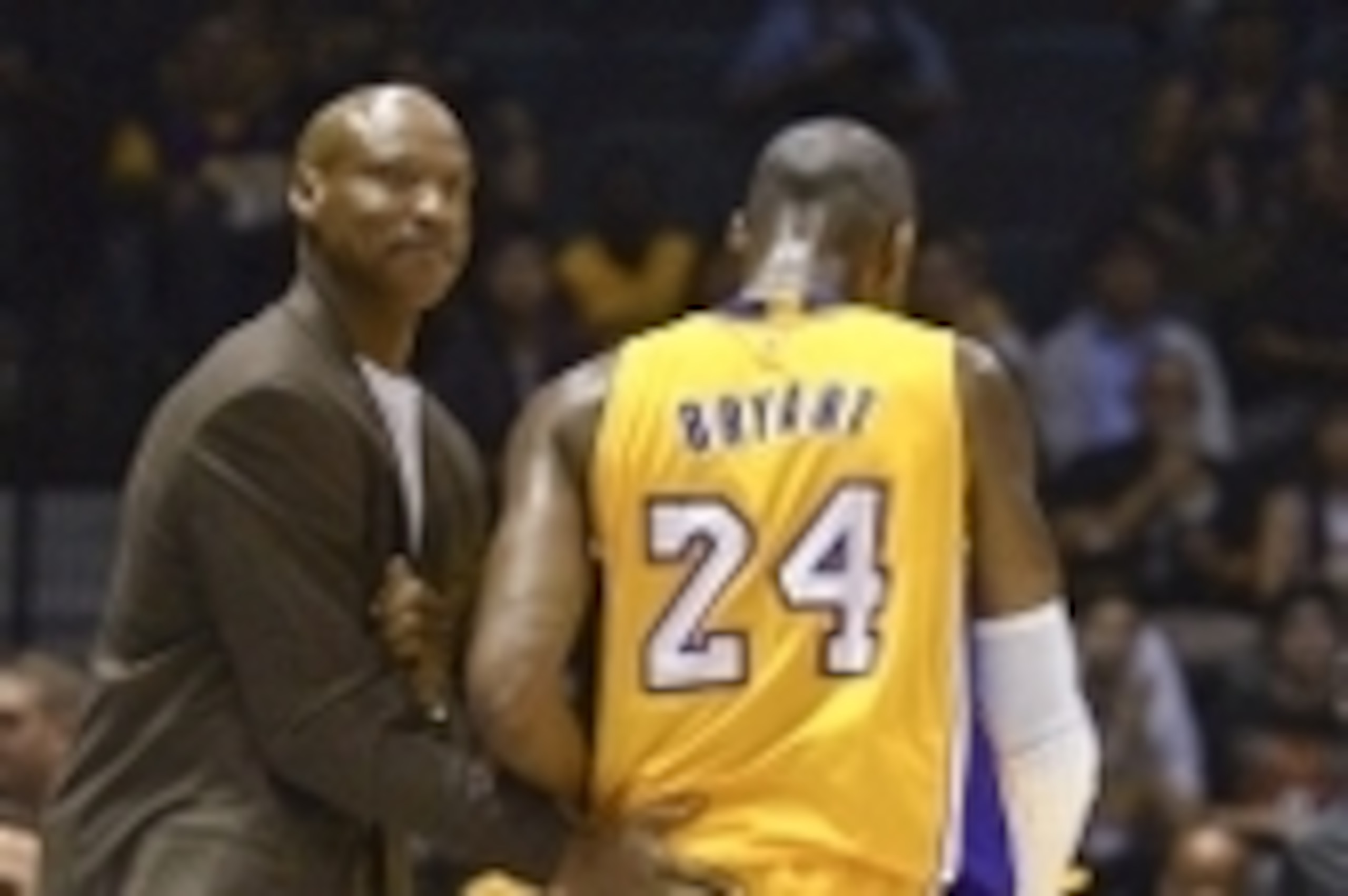 Oct 6, 2014; San Diego, CA, USA; Los Angeles Lakers head coach Byron Scott (left) pats guard Kobe Bryant (24) on the back during the first half against the Denver Nuggets at Valley View Casino Center. Mandatory Credit: Jake Roth-USA TODAY Sports