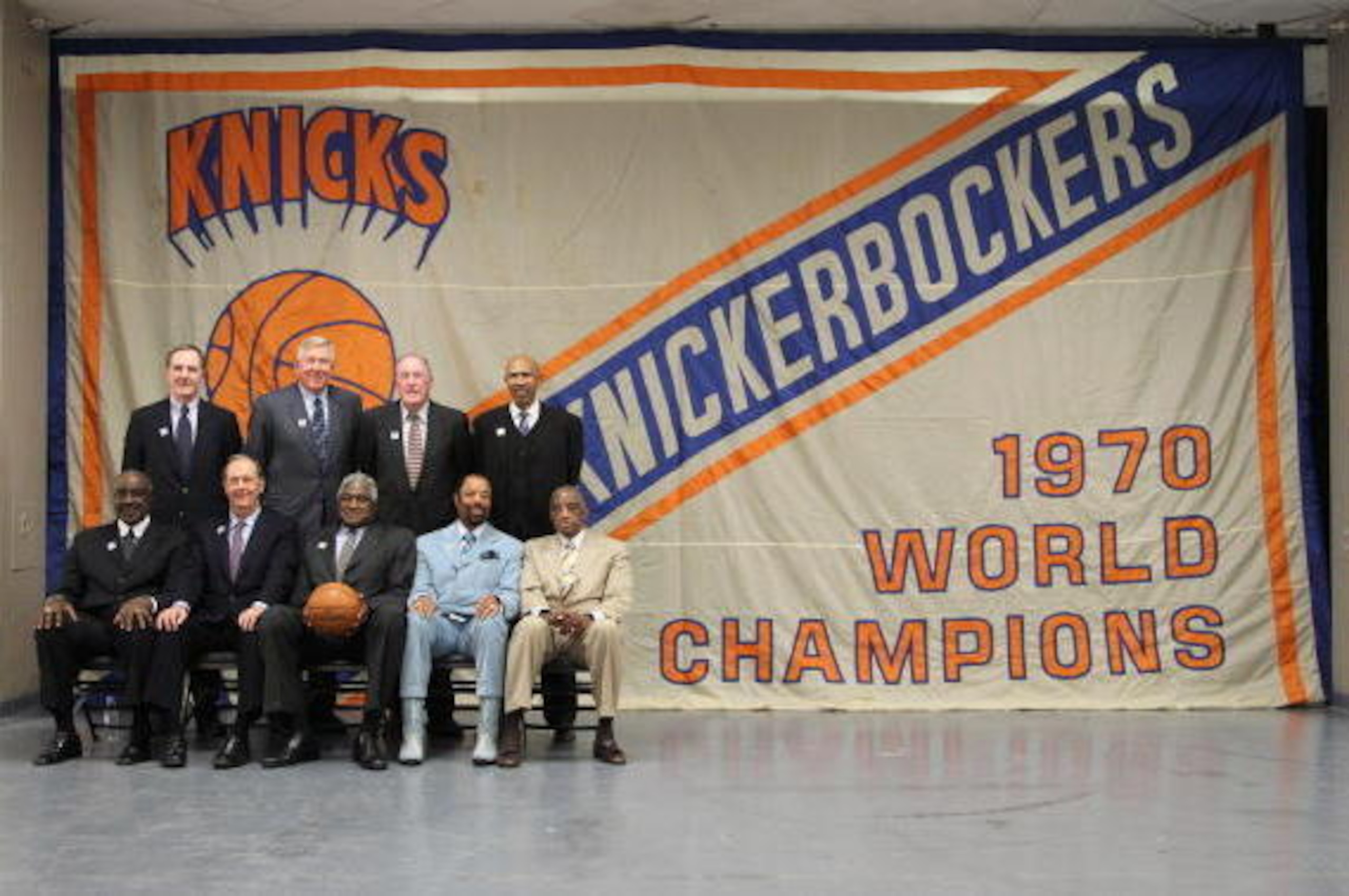 NEW YORK - FEBRUARY 22: (top row left to right) Don May, Bill Hosket, Mike Rordan and John Warren (bottom row left to right) Cazzie Russell, Bill Bradley, Willis Reed, Walt Frazier and Dick Barnett of the 1970 World Champion New York Knicks  pose for a ph