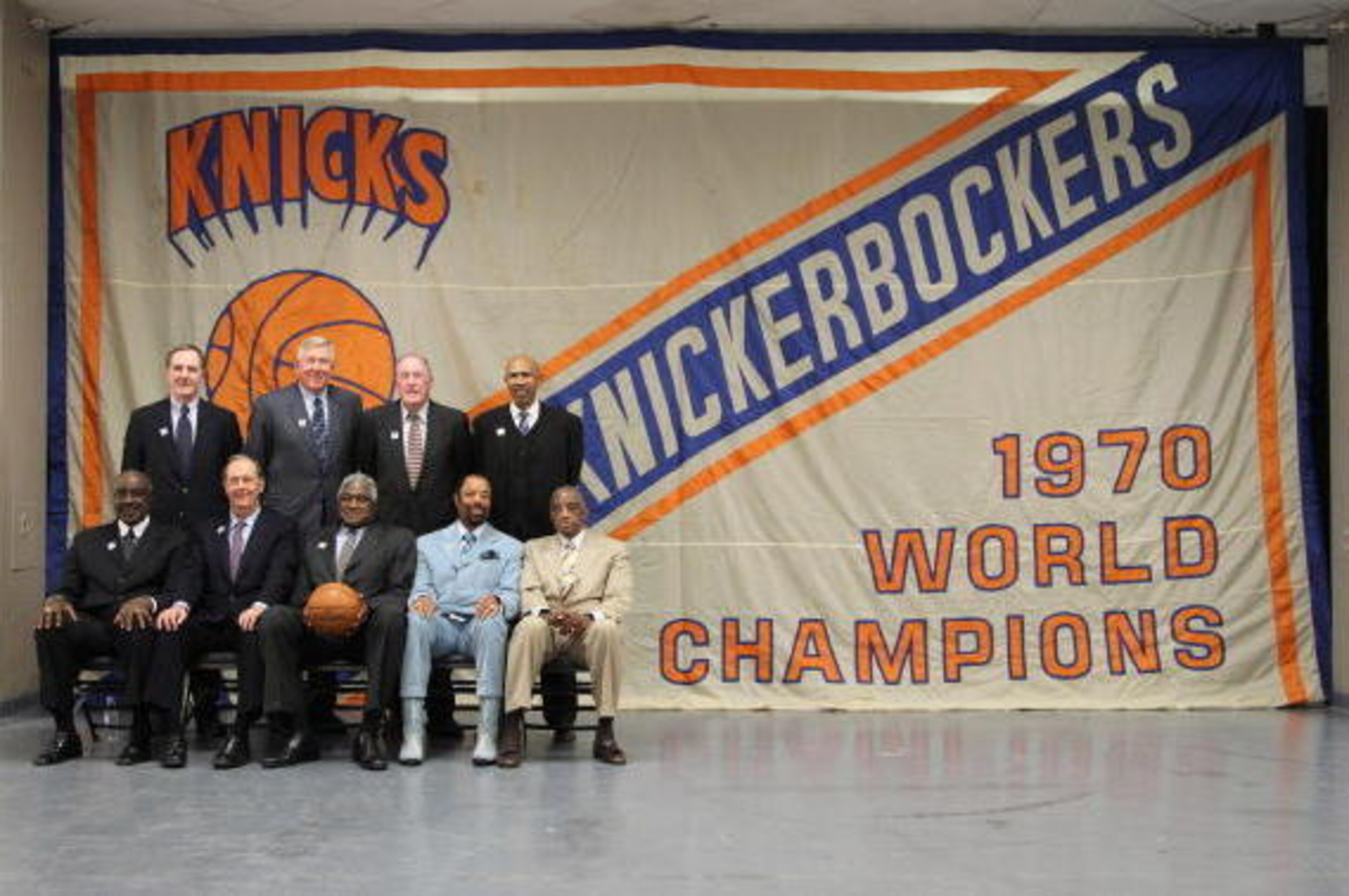 NEW YORK - FEBRUARY 22: (top row left to right) Don May, Bill Hosket, Mike Rordan and John Warren (bottom row left to right) Cazzie Russell, Bill Bradley, Willis Reed, Walt Frazier and Dick Barnett of the 1970 World Champion New York Knicks  pose for a ph