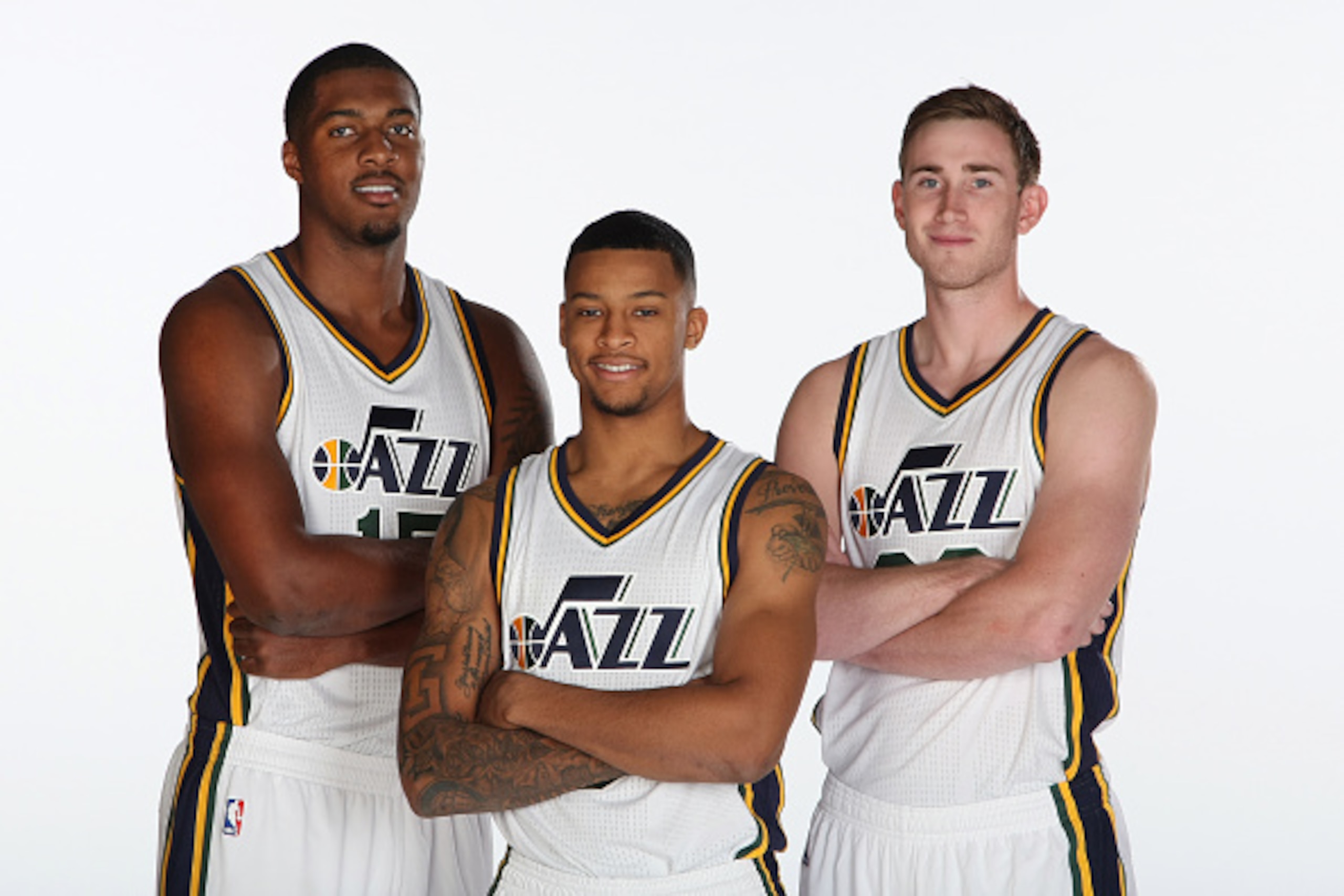 SALT LAKE CITY, UT - SEPTEMBER 29:  (from left) Derrick Favors #15, Trey Burke #3 and Gordon Hayward #20 of the Utah Jazz pose for a photo during the 2014 NBA Jazz Media Day at Zions Basketball Center on September 29, 2014 in Salt Lake City, Utah. NOTE TO