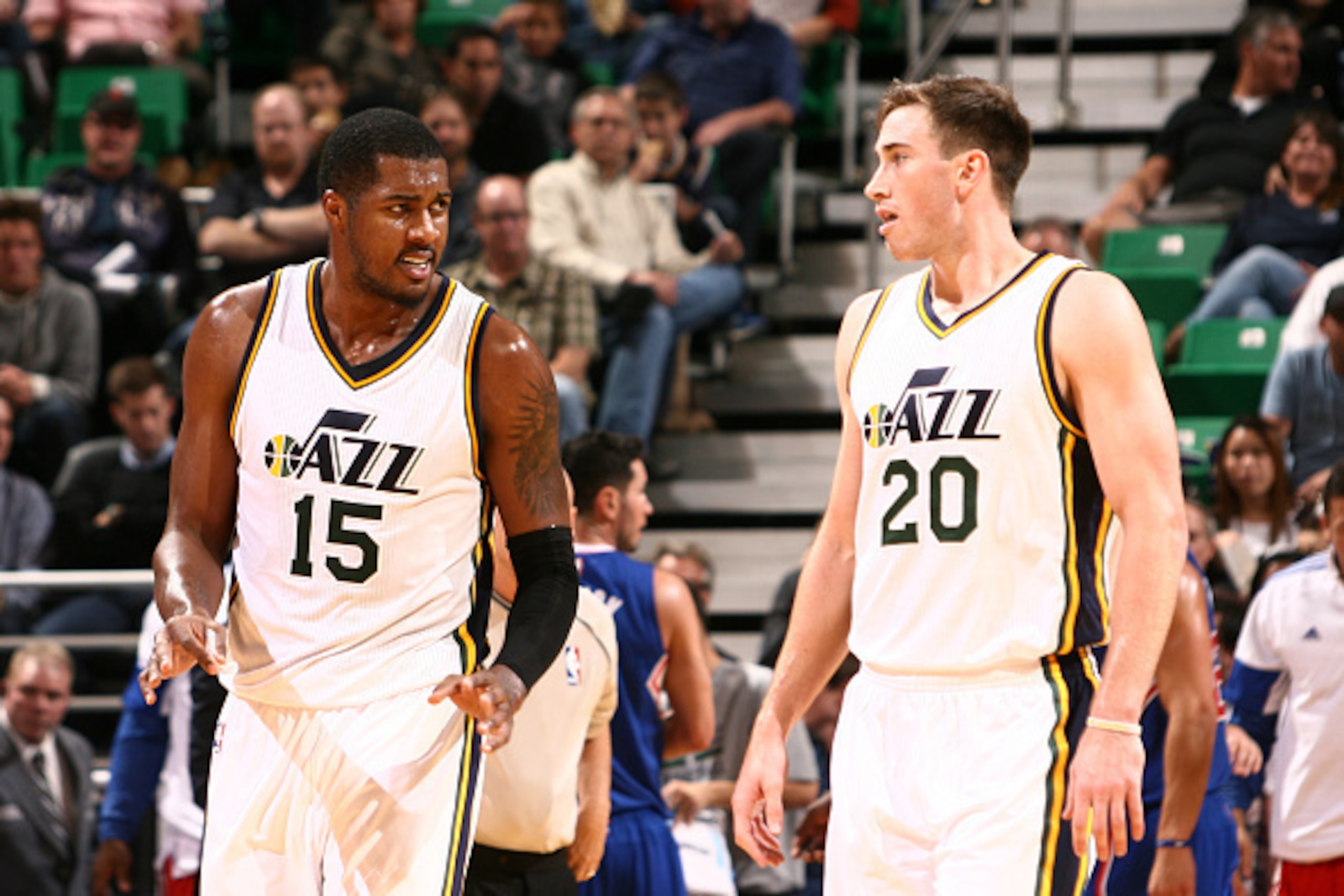SALT LAKE CITY, UT - OCTOBER 13:  Derrick Favors #15 and Gordon Hayward #20 of the Utah Jazz talk during the game against the Los Angeles Clippers at EnergySolutions Arena on October 13, 2014 in Salt Lake City, Utah. NOTE TO USER: User expressly acknowled