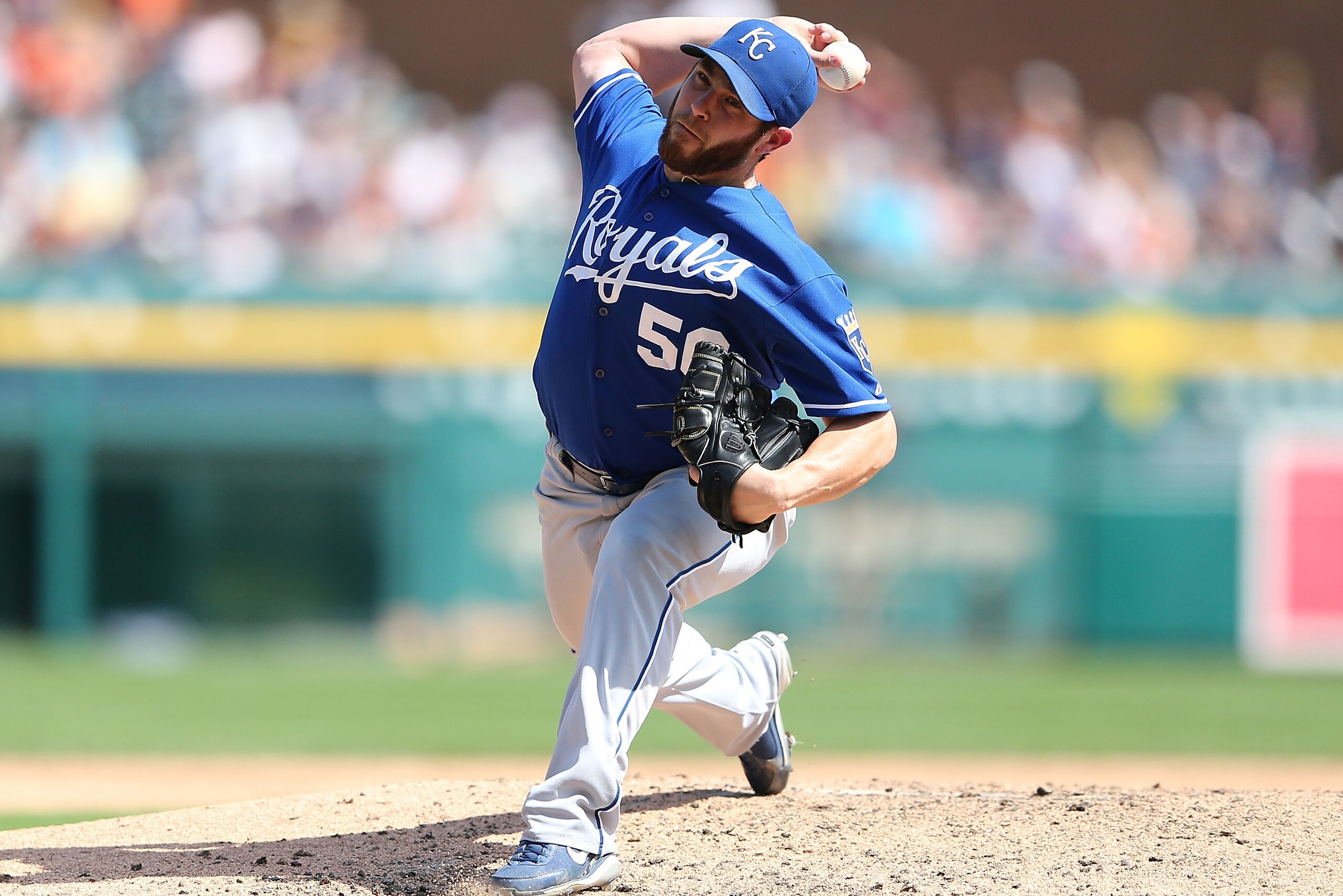 DETROIT, MI - AUGUST 16: Greg Holland #56 of the Kansas City Royals pitches in the ninth inning of game one of the double header against the Detroit Tigers at Comerica Park on August 16, 2013 in Detroit, Michigan. The Royals defeated the Royals 2-1. (Pho DETROIT, MI - AUGUST 16: Greg Holland #56 of the Kansas City Royals pitches in the ninth inning of game one of the double header against the Detroit Tigers at Comerica Park on August 16, 2013 in Detroit, Michigan. The Royals defeated the Royals 2-1. (Pho