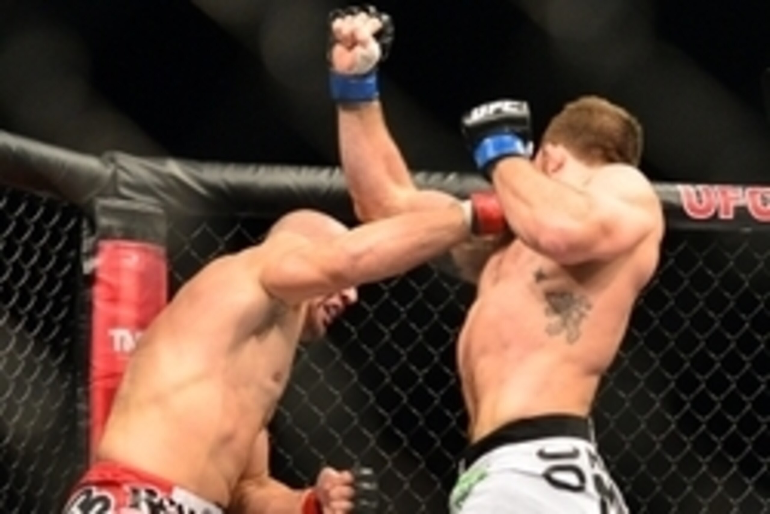Sep 4, 2013; Belo Horizonte, BRAZIL; Glover Teixeira (left) fights against Ryan Bader  during UFC Fight Night at Mineirinho Arena. Mandatory Credit: Jason Silva-USA TODAY Sports