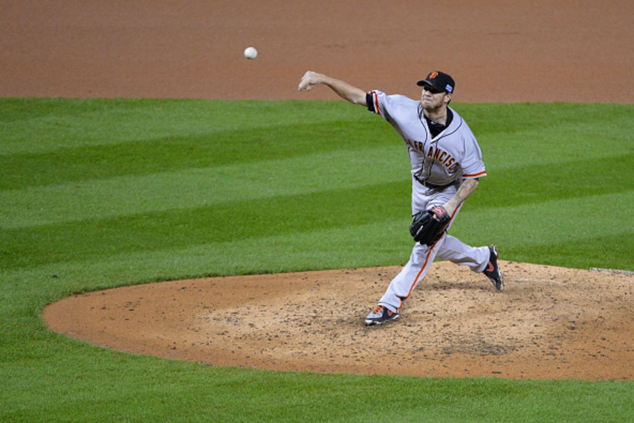 ST LOUIS, MO - OCTOBER 12:  Jake Peavy #22 of the San Francisco Giants pitches in the third inning against the St. Louis Cardinals during Game Two of the National League Championship Series at Busch Stadium on October 12, 2014 in St Louis, Missouri.  (Pho