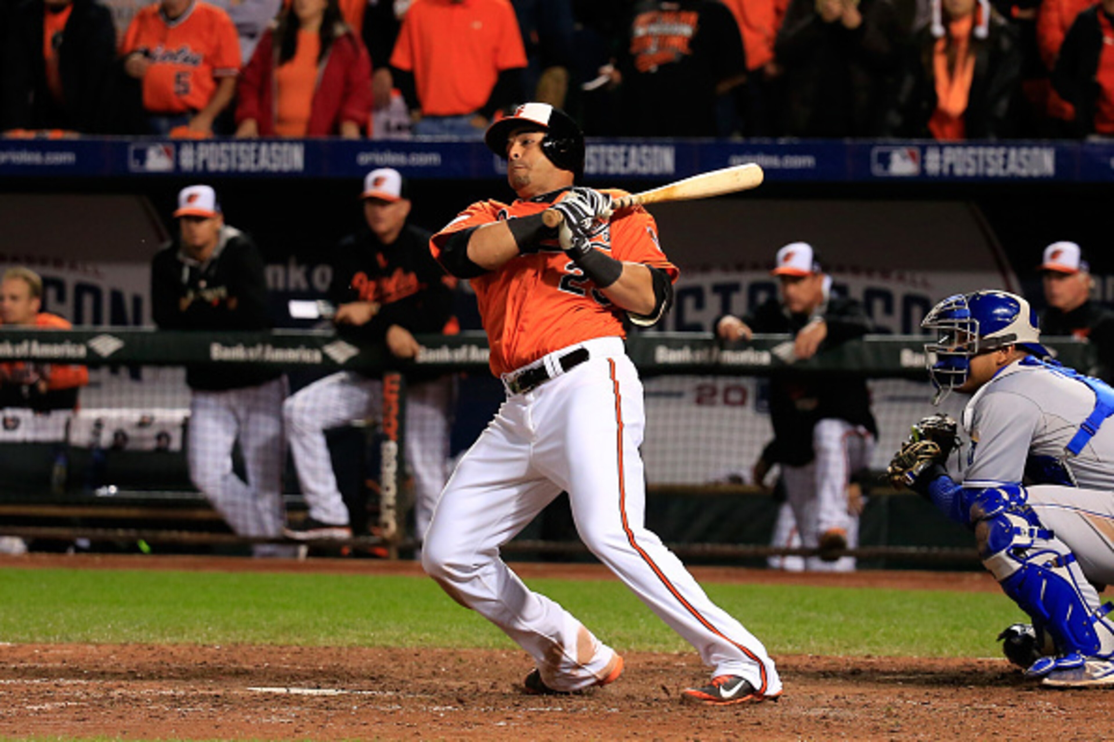 BALTIMORE, MD - OCTOBER 11:  Nelson Cruz #23 of the Baltimore Orioles hits a single to left field to load the bases in the seventh inning against Kelvin Herrera #40 of the Kansas City Royals during Game Two of the American League Championship Series at Or